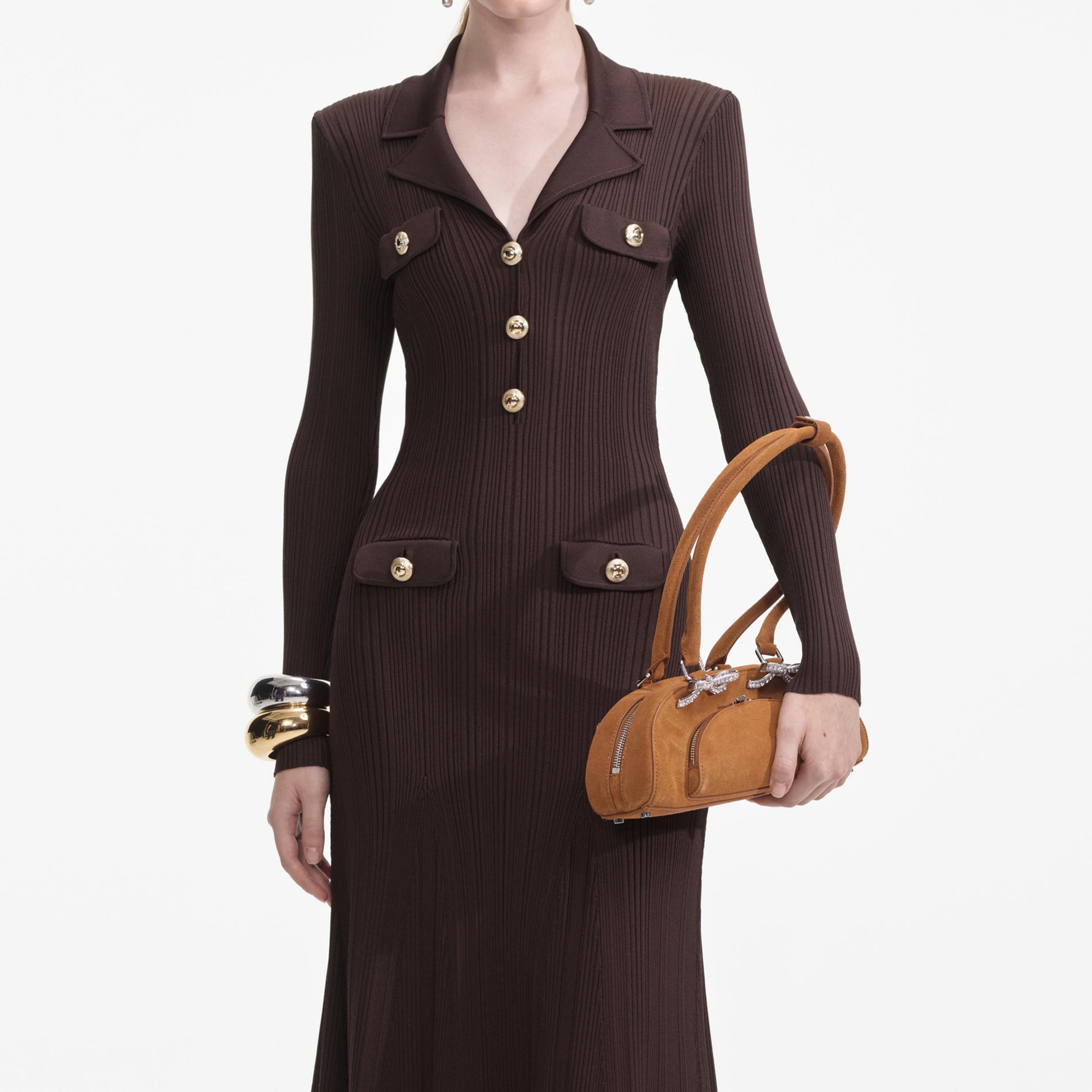 A close up of a woman wearing the Brown Viscose Rib Knit Midi Dress