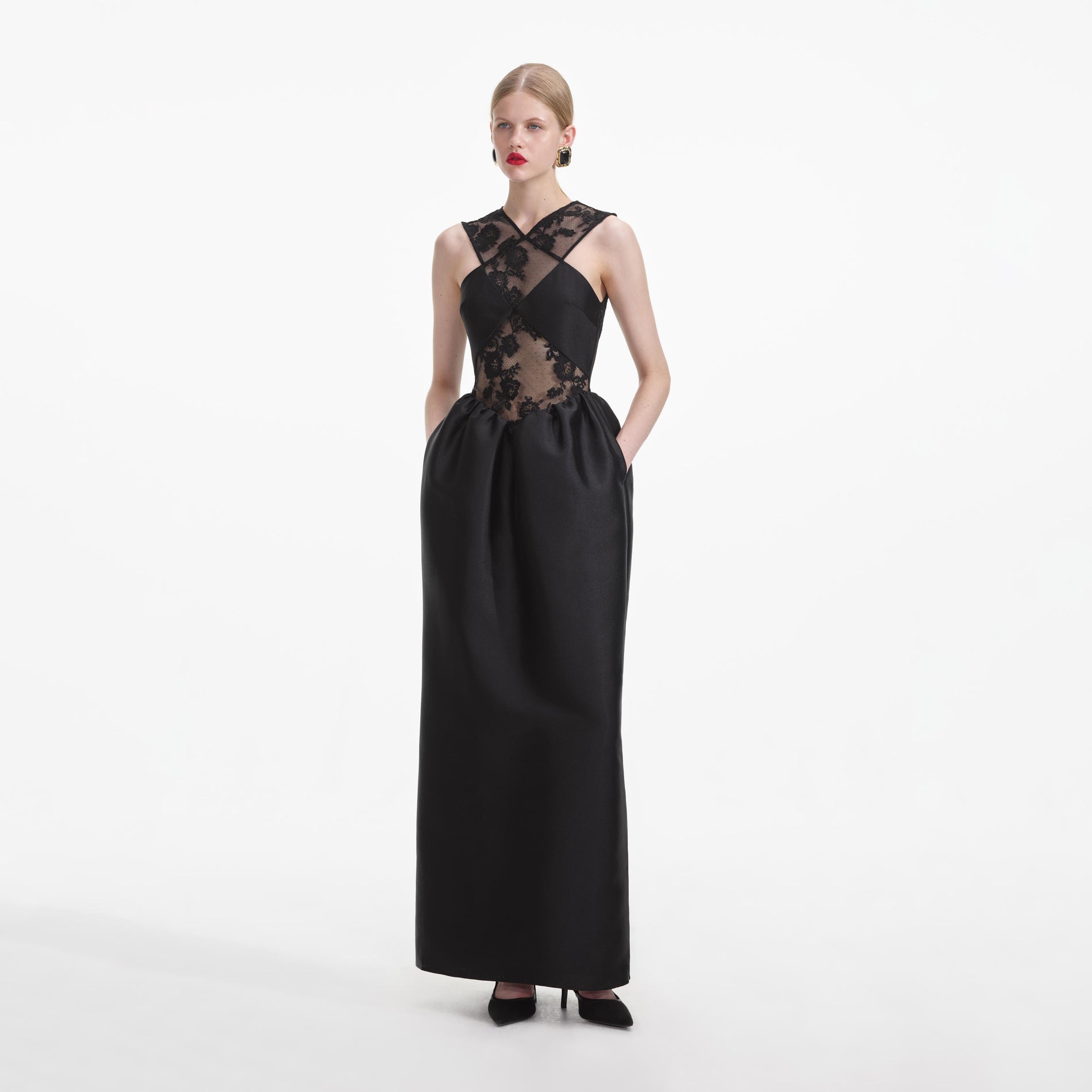 Side view of a woman wearing the Black Lace Taffeta Maxi Dress