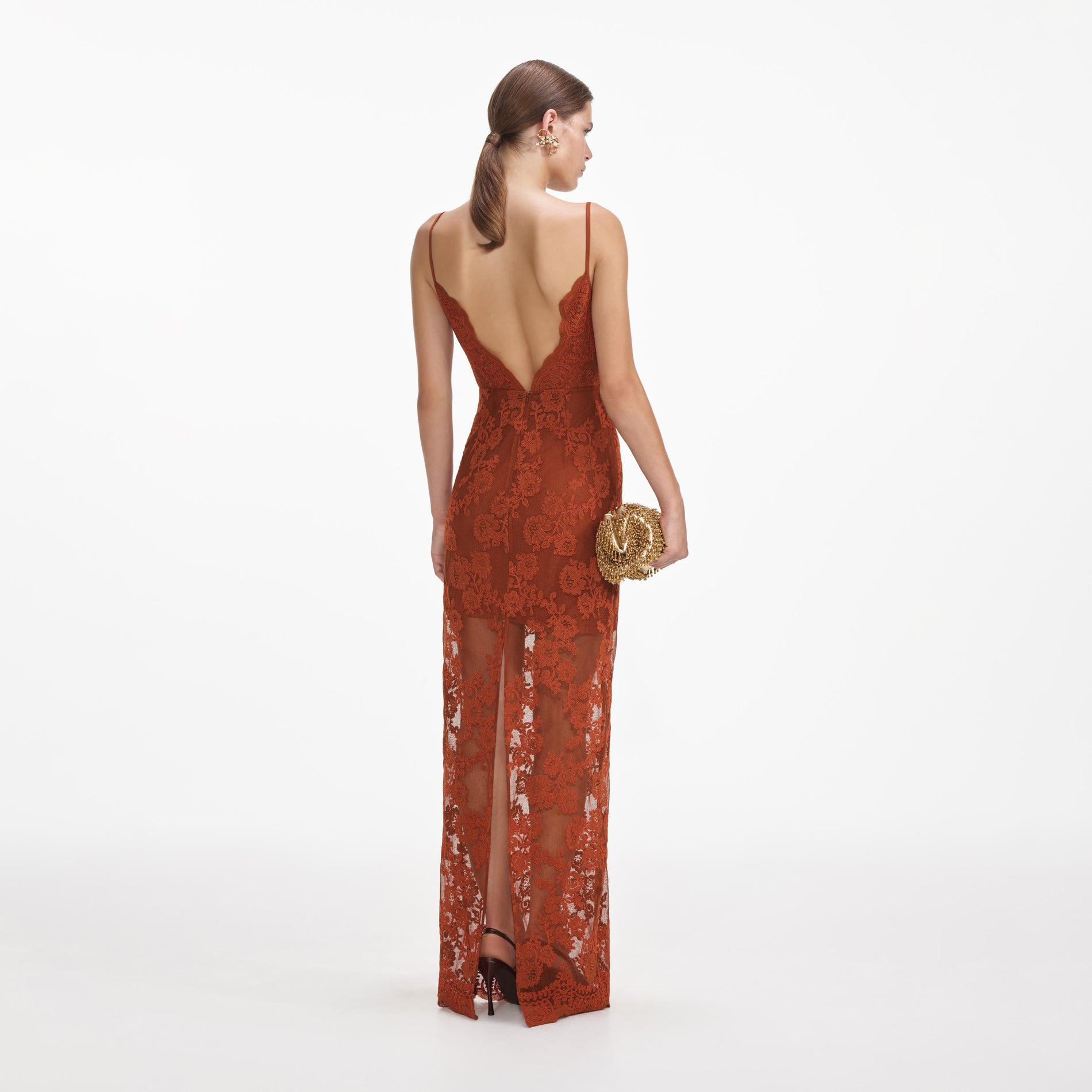 Back view of a woman wearing the Brown Lace Maxi Dress