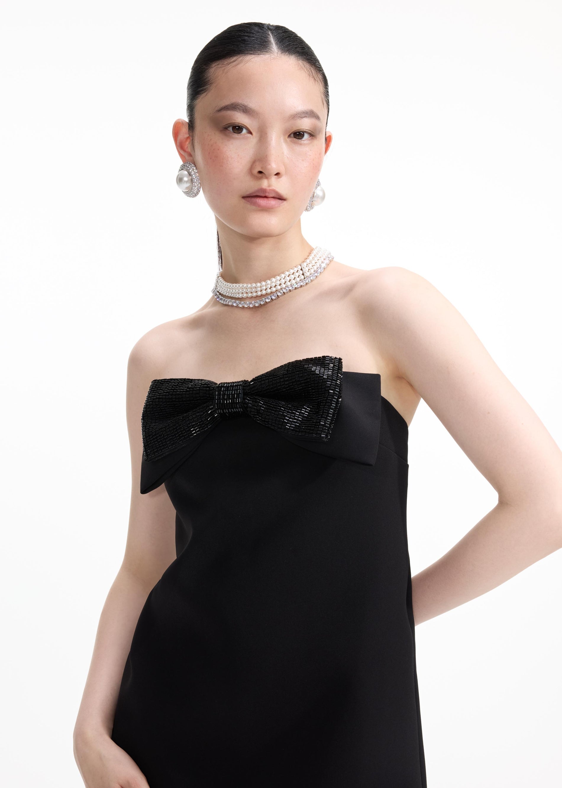 A close up of the fabric for the Pearl Diamante Necklace