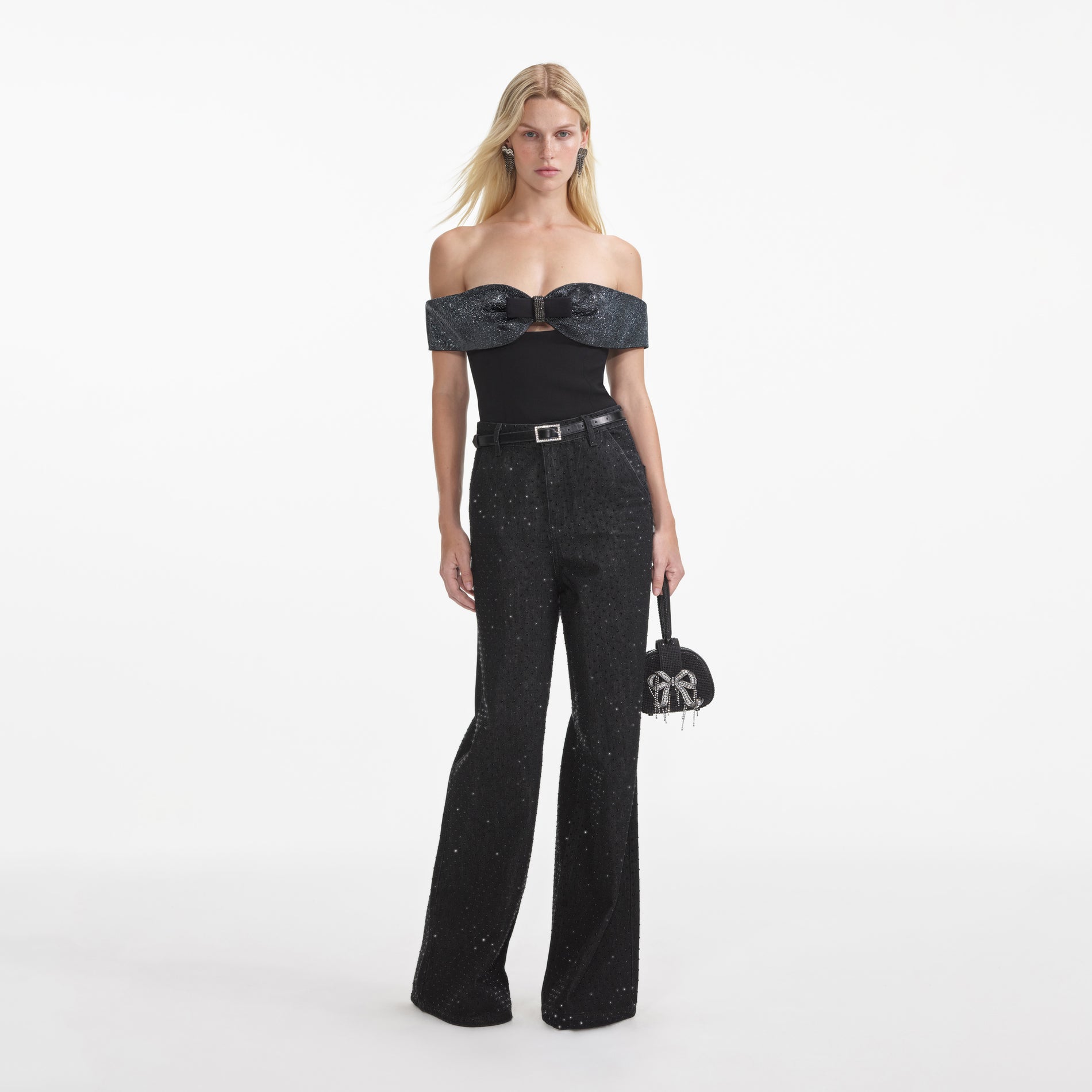 Front view of a woman wearing the Black Crepe Bow Top