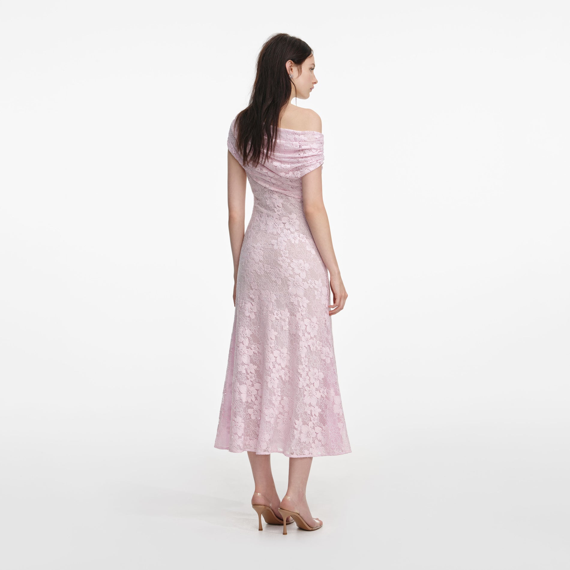 Back view of a woman wearing the Pink Rhinestone Lace Midi Dress
