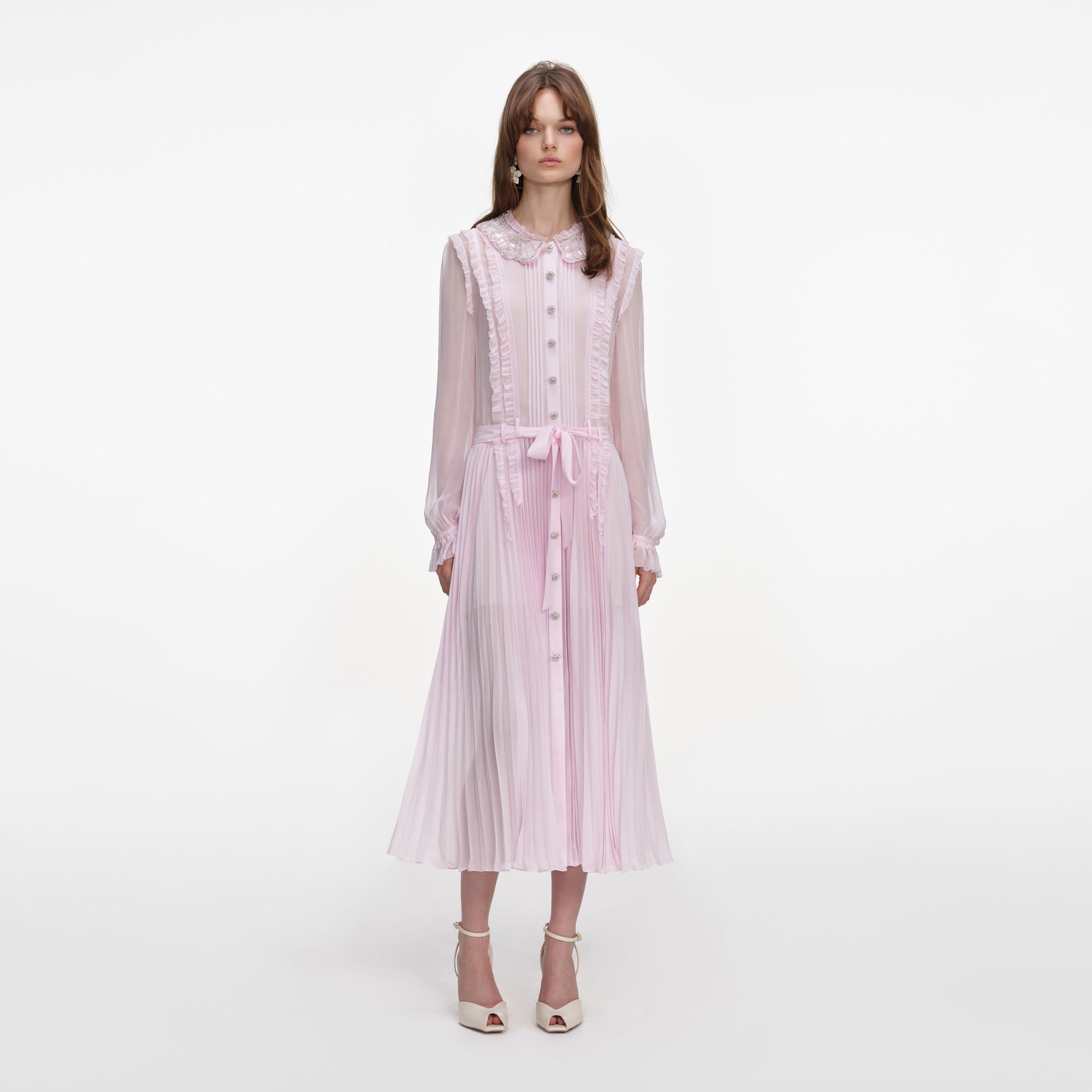 Front view of a woman wearing the Pink Pleated Georgette Midi Dress