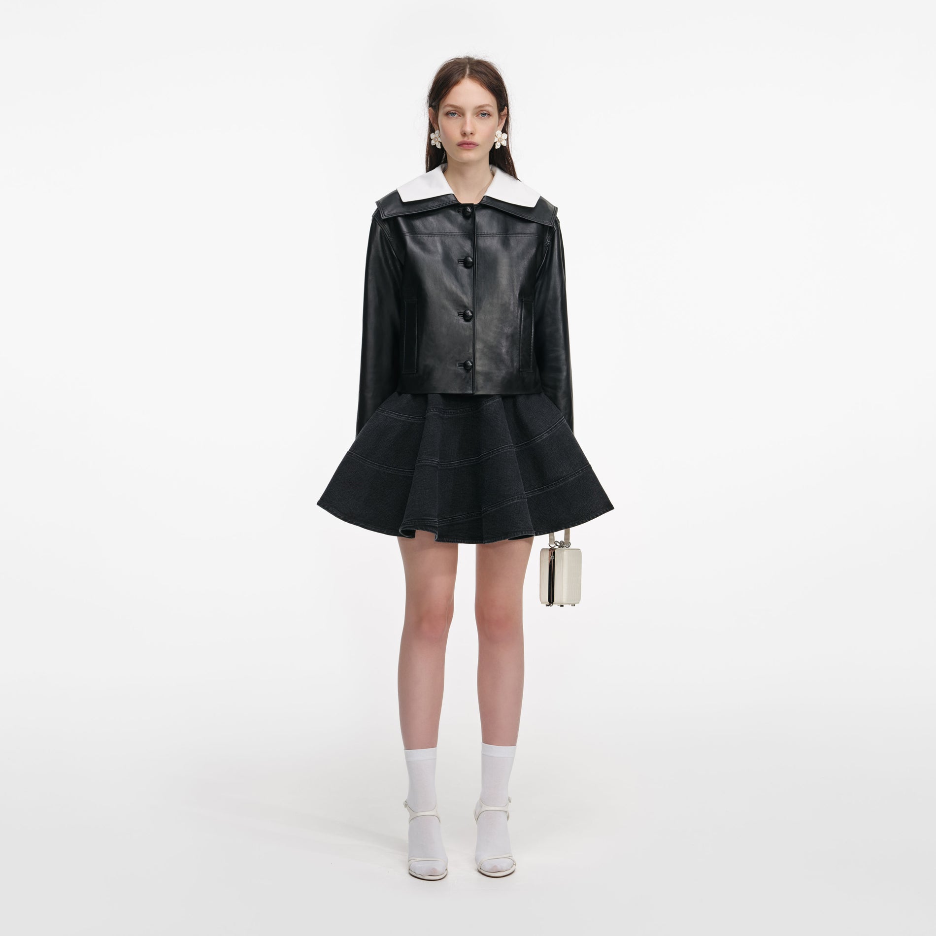 Front view of a woman wearing the Black Leather Contrast Collar Jacket