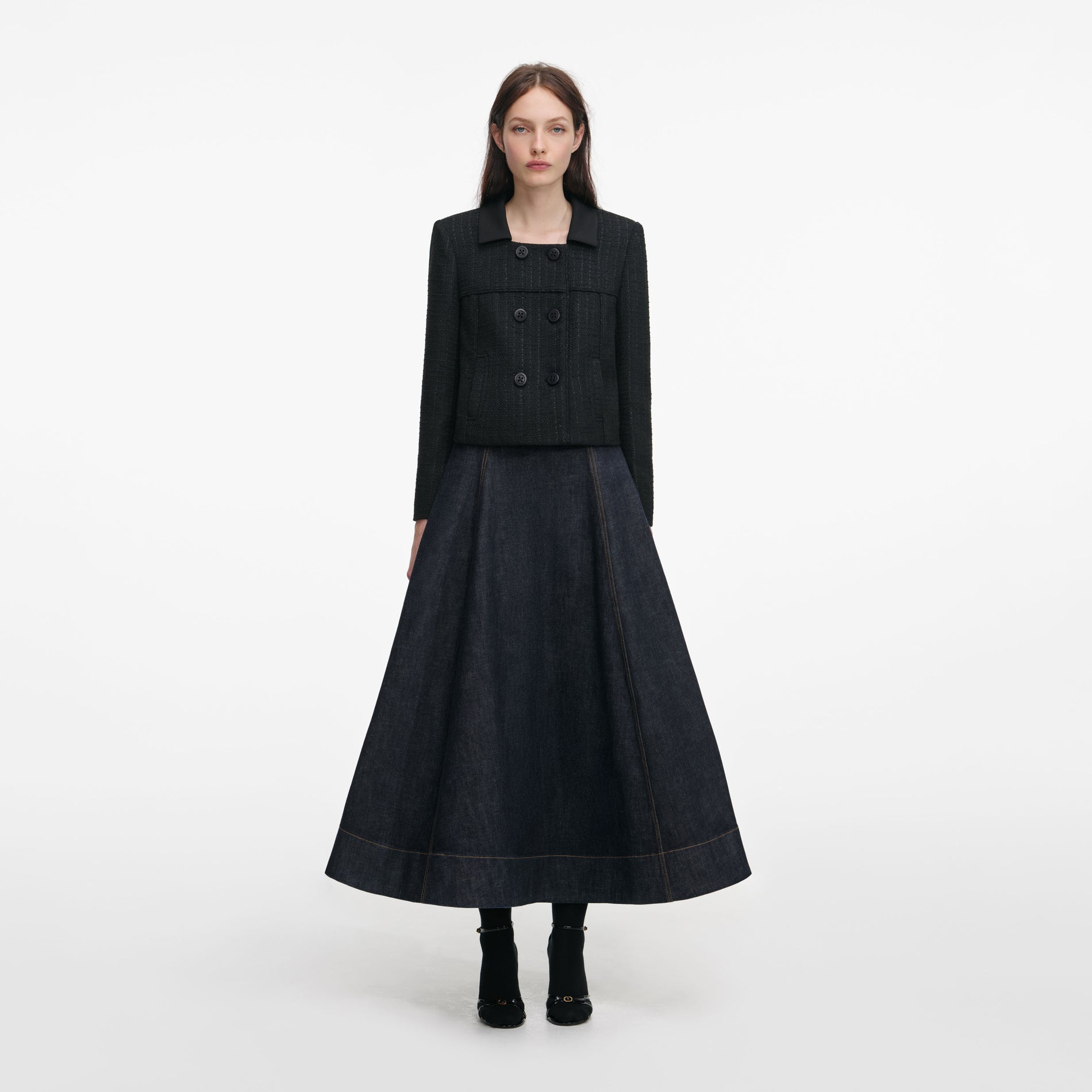 Front view of a woman wearing the Black Boucle Cropped Jacket