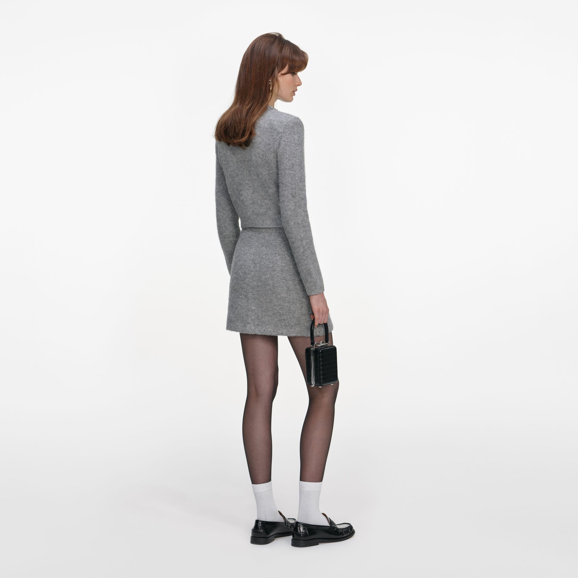 Back view of a woman wearing the Grey Fluffy Crystal Trim Cardigan