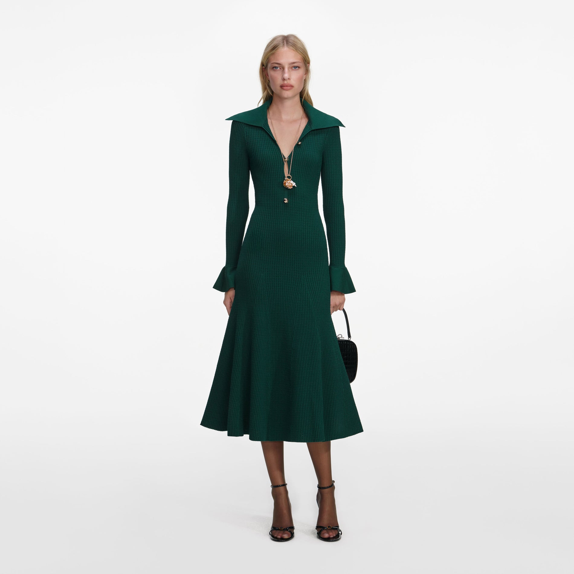 Front view of a woman wearing the Green Keyhole Knit Midi Dress