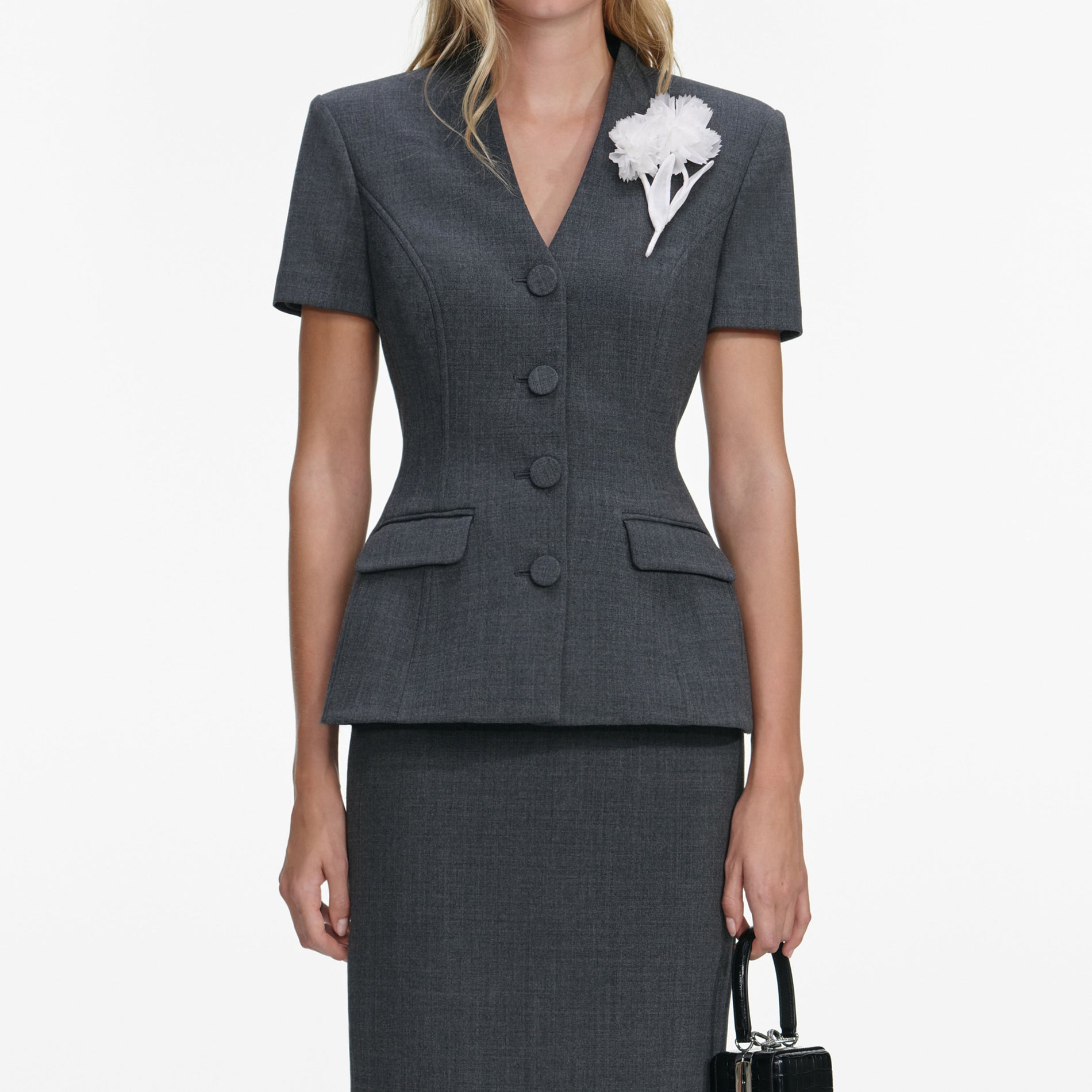 A close up of a woman wearing the Grey Tailored Flower Detail Midi Dress