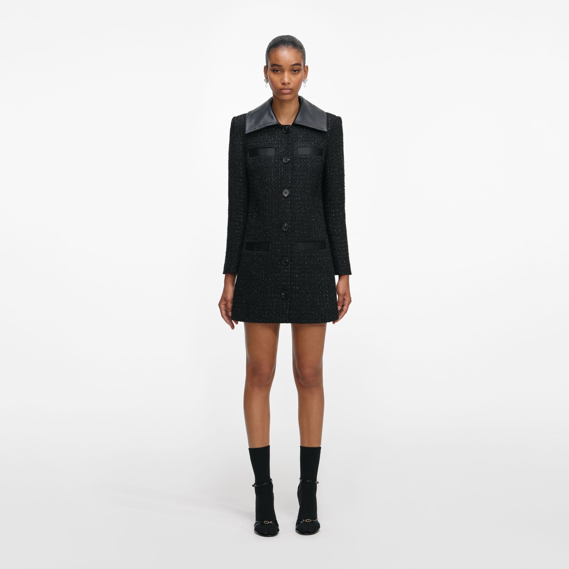 A close up of a woman wearing the Black Boucle Contrast Collar Mini Dress
