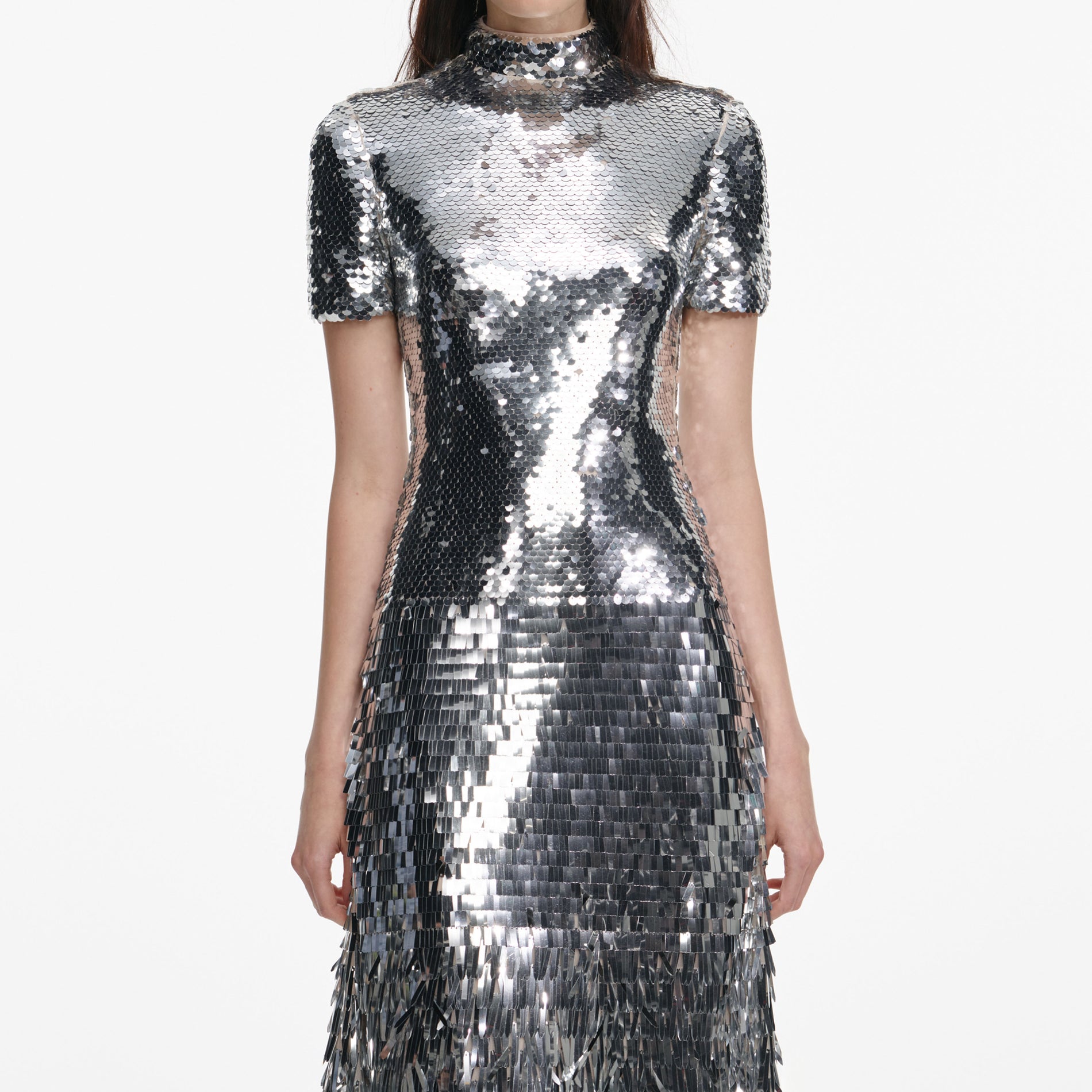 A close up of a woman wearing the Silver Gradient Sequin Midi Dress