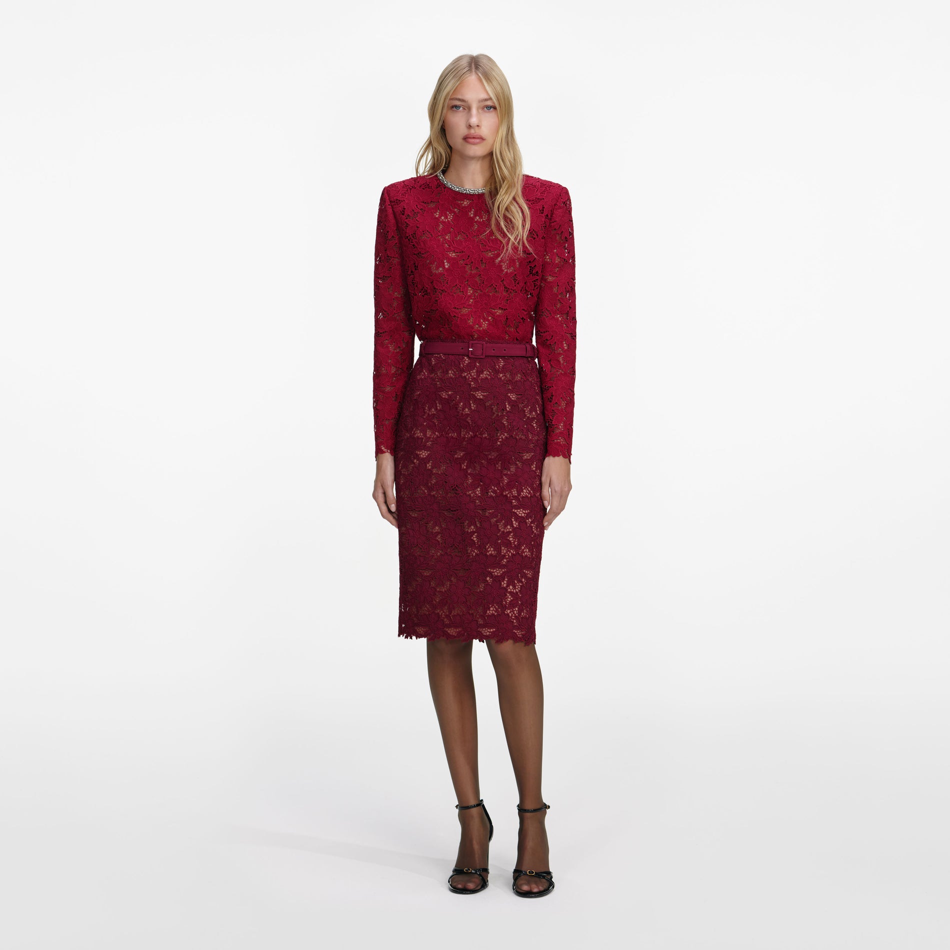 Front view of a woman wearing the Burgundy Guipure Lace Midi Skirt