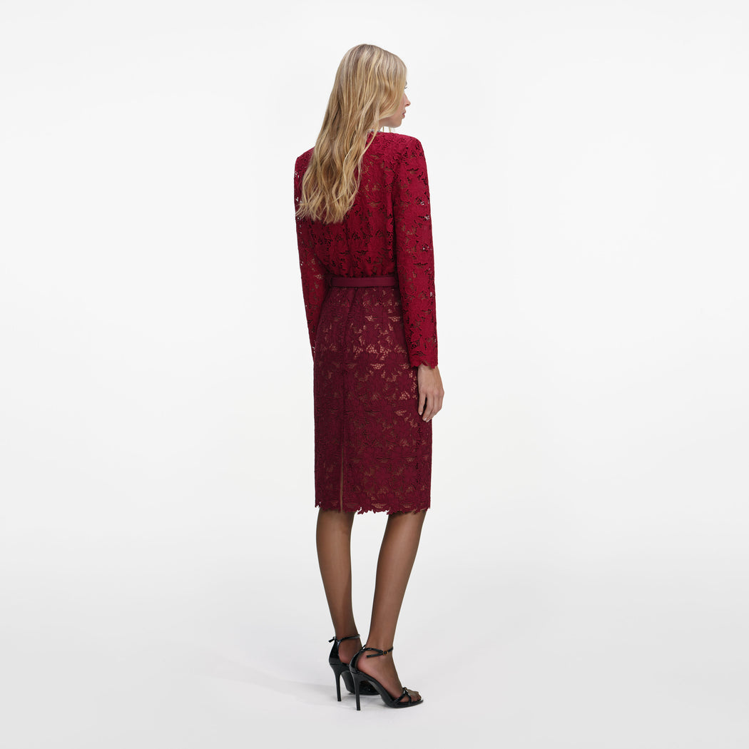 Back view of a woman wearing the Burgundy Guipure Lace Midi Skirt