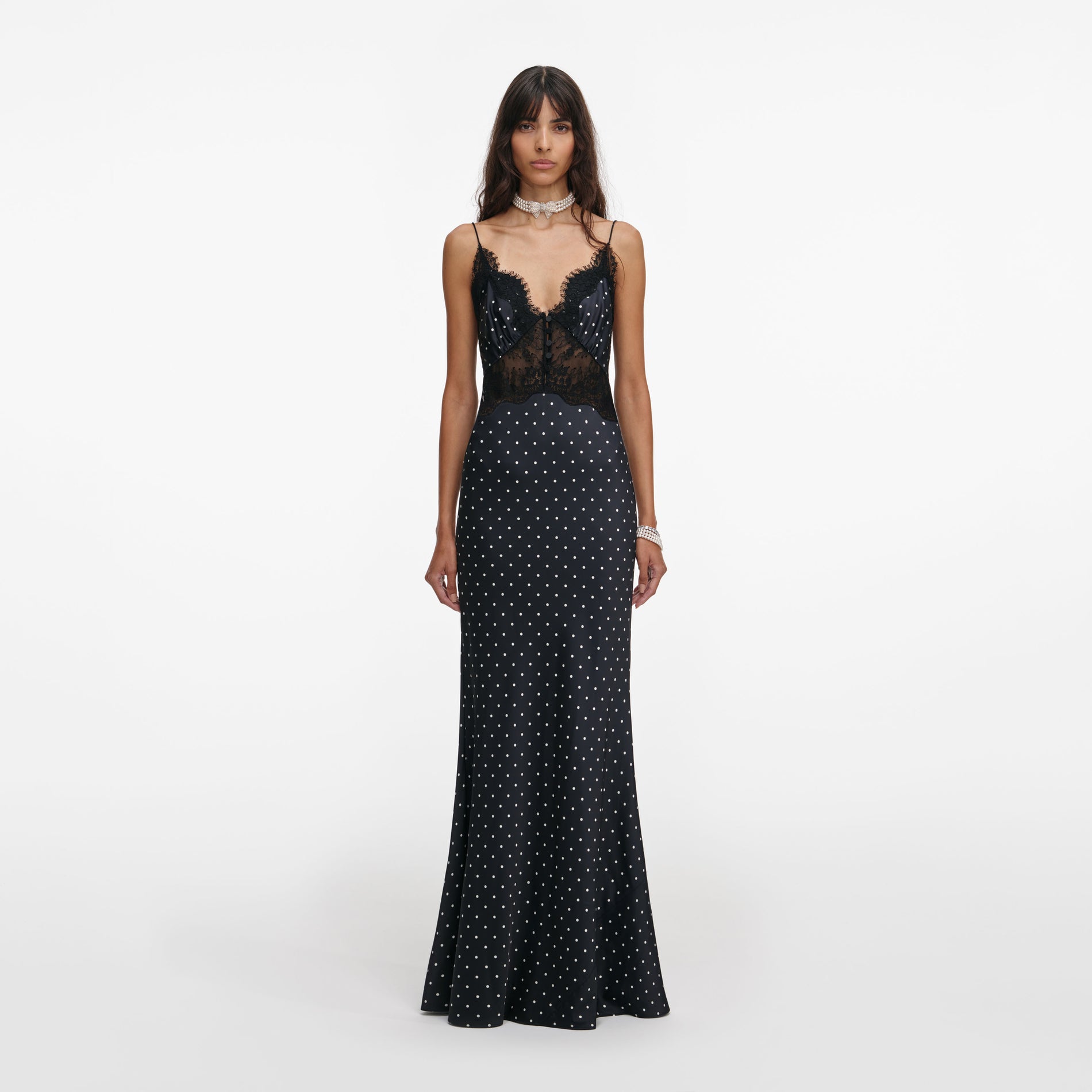 Front view of a woman wearing the Polka Dot Satin Lace Maxi Dress