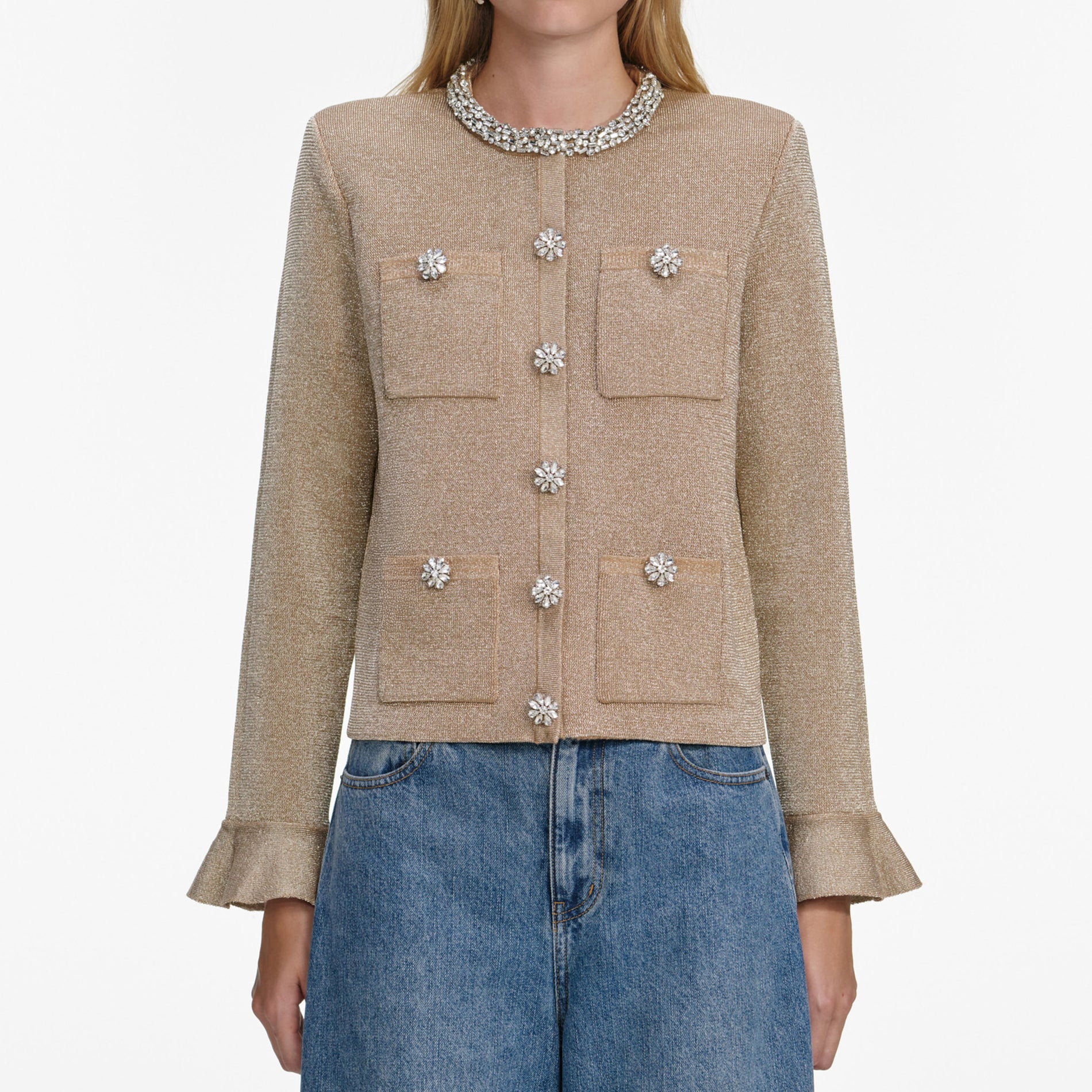 A close up of a woman wearing the Gold Crystal Trim Cardigan