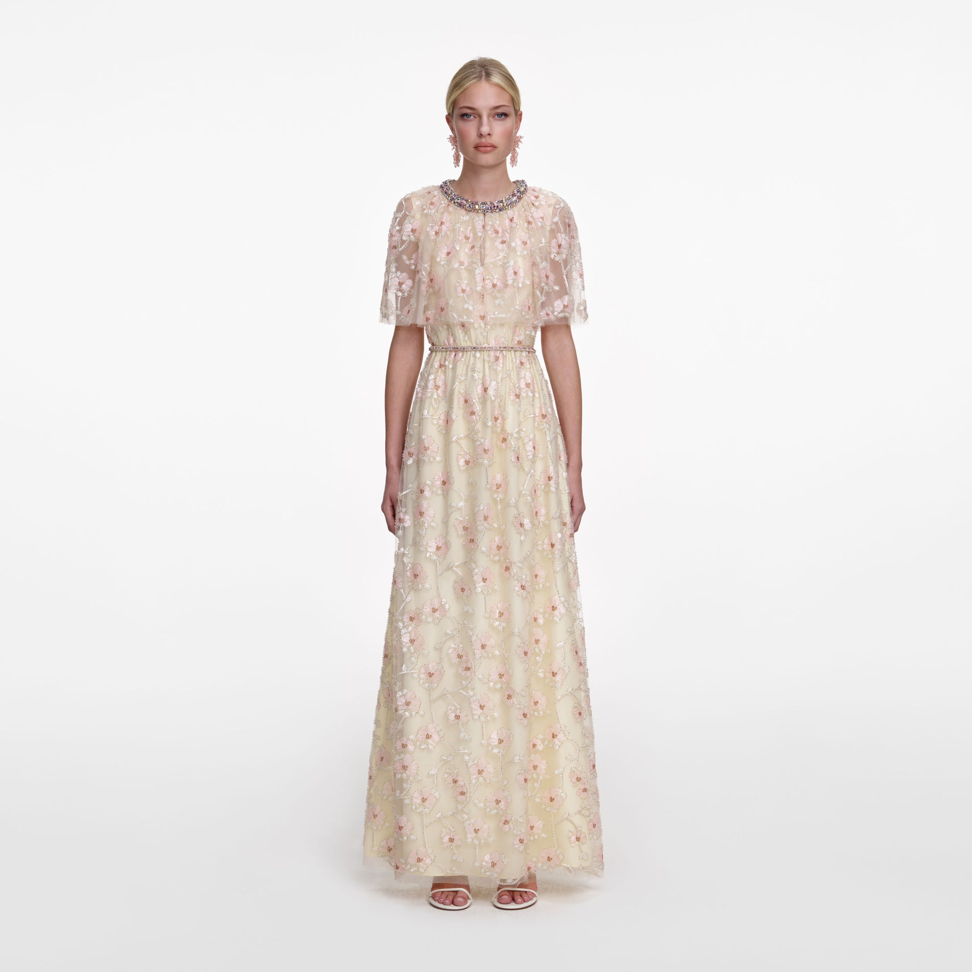 Front view of a woman wearing the Champagne Floral Embellished Maxi Dress
