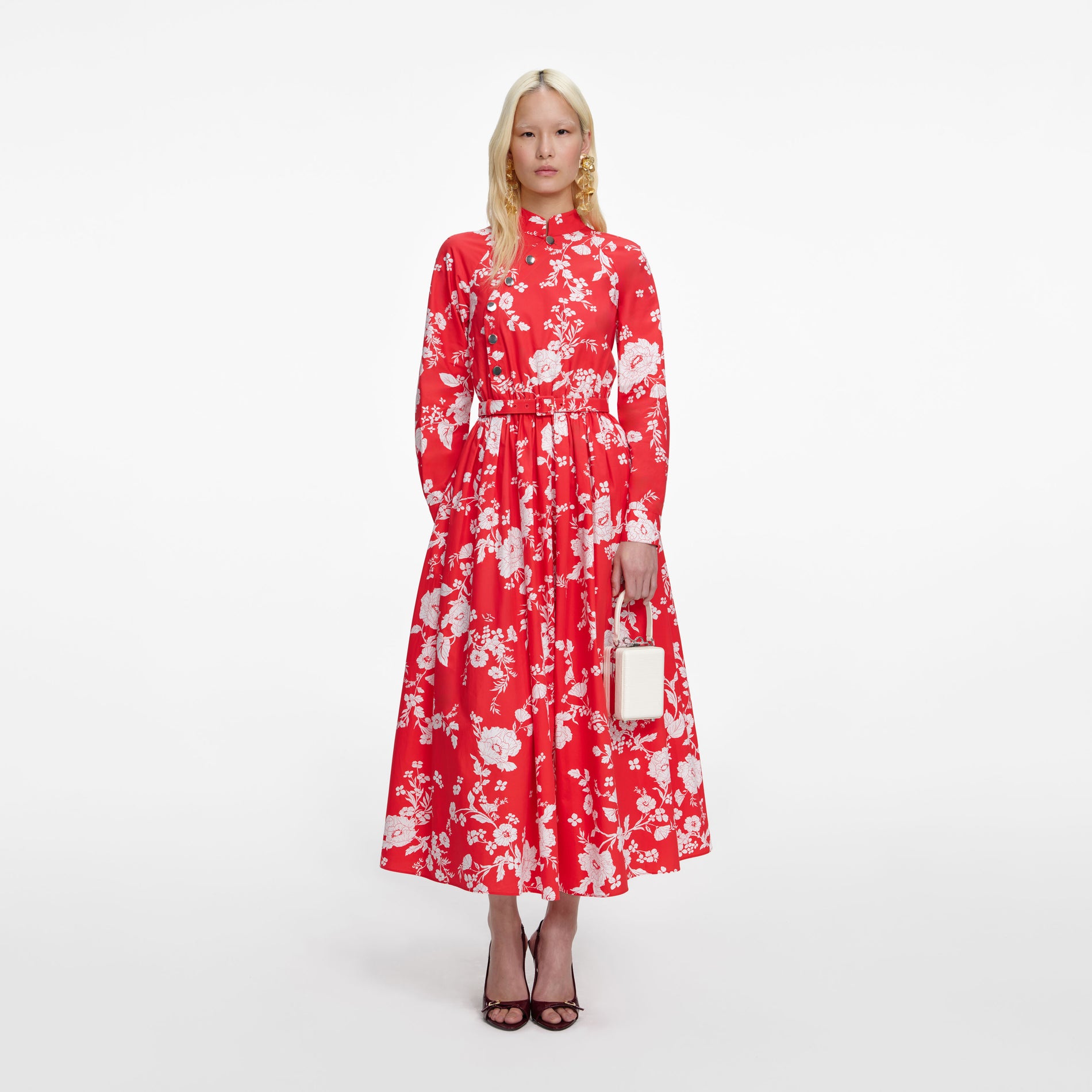 Front view of a woman wearing the Red Floral Cotton Midi Dress