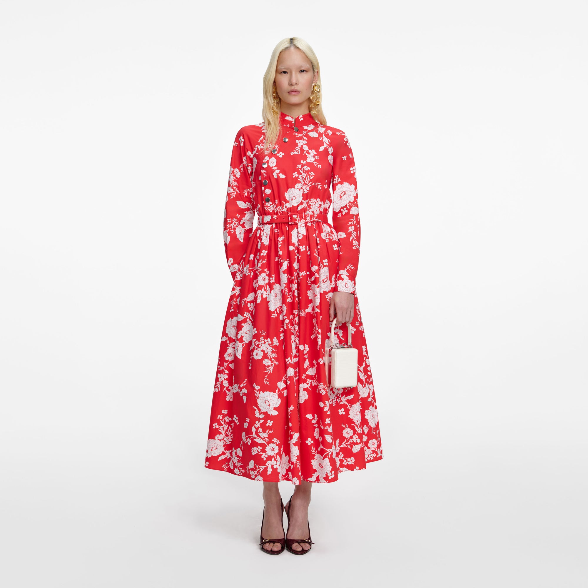 Front view of a woman wearing the Red Floral Cotton Midi Dress