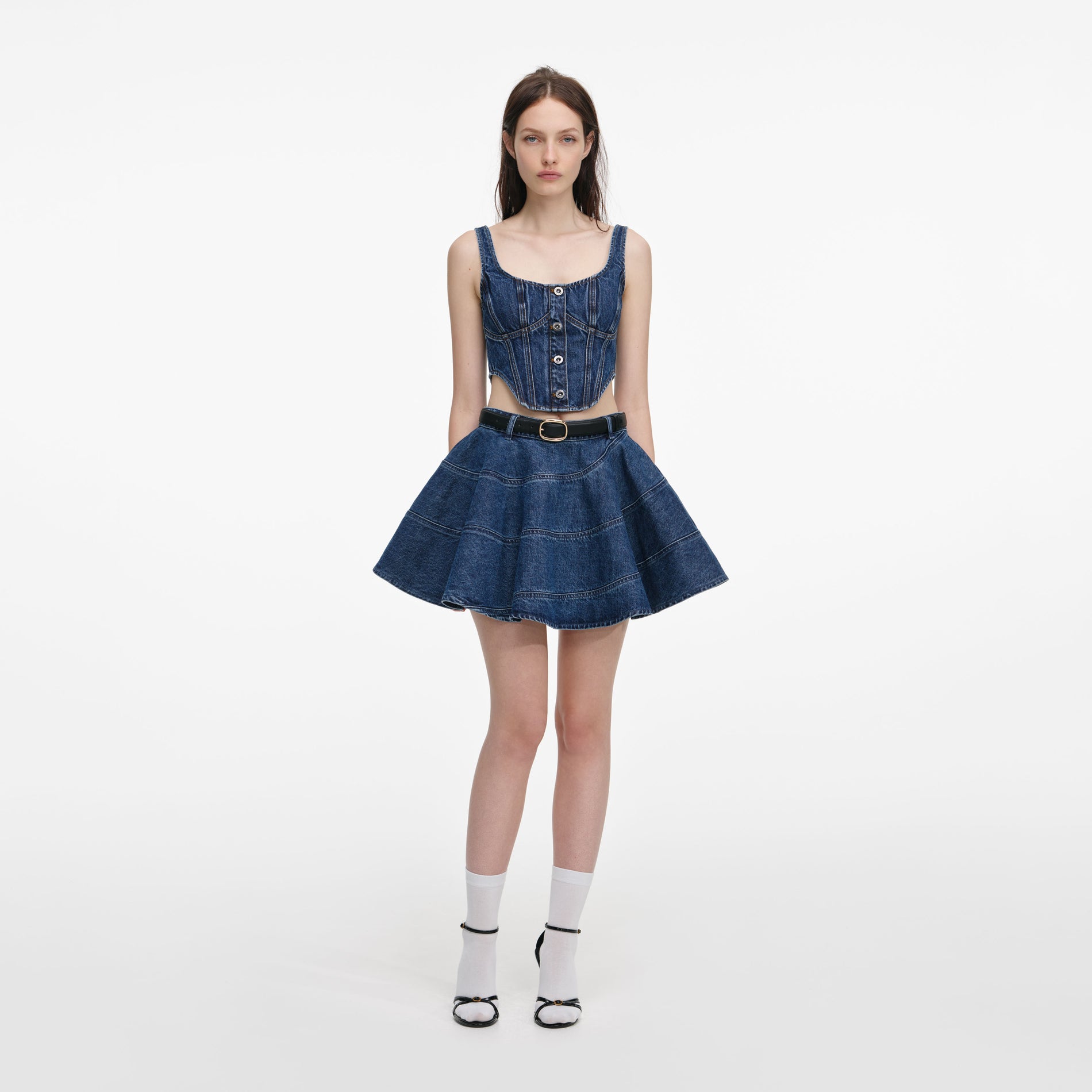 Front view of a woman wearing the Denim Corset Top