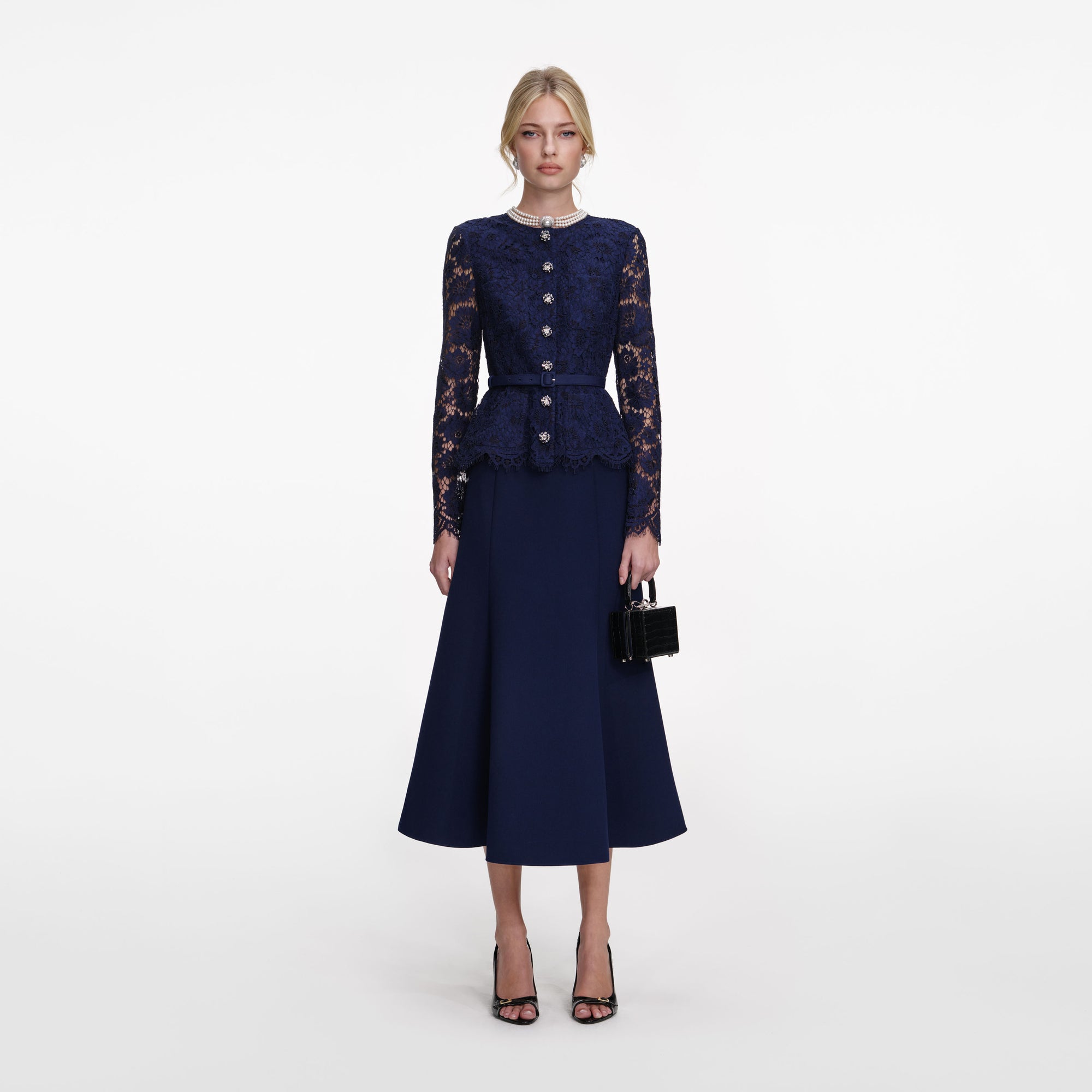 Front view of a woman wearing the Navy Tailored Lace Midi Dress