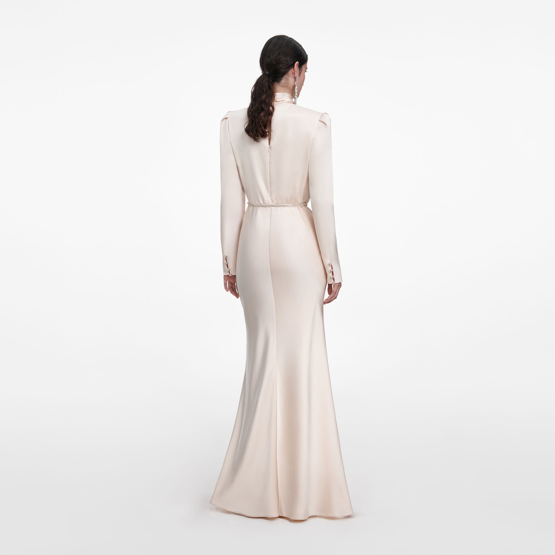 Back view of a woman wearing the Champagne Satin Maxi Dress