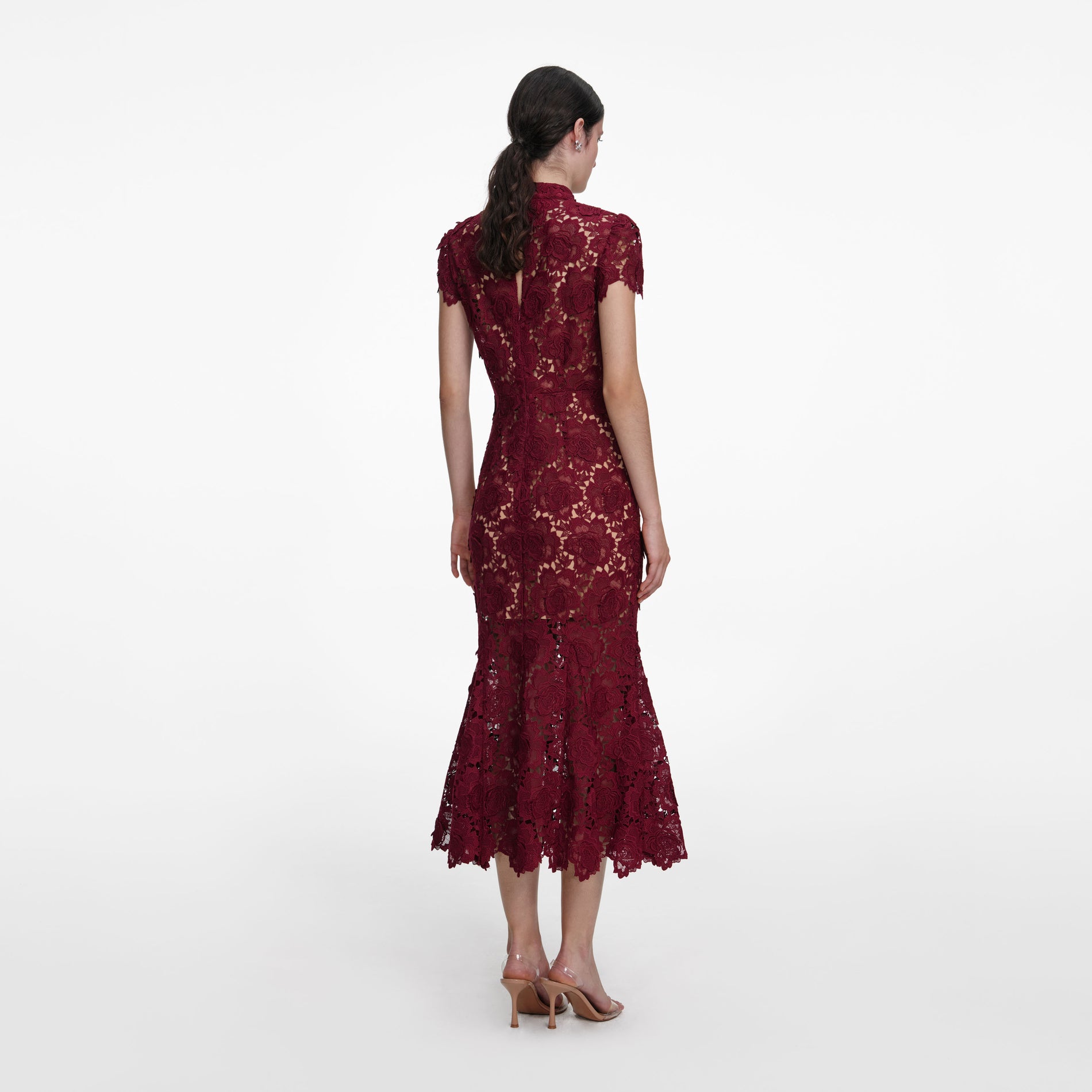 Back view of a woman wearing the Burgundy Flower Lace Midi Dress