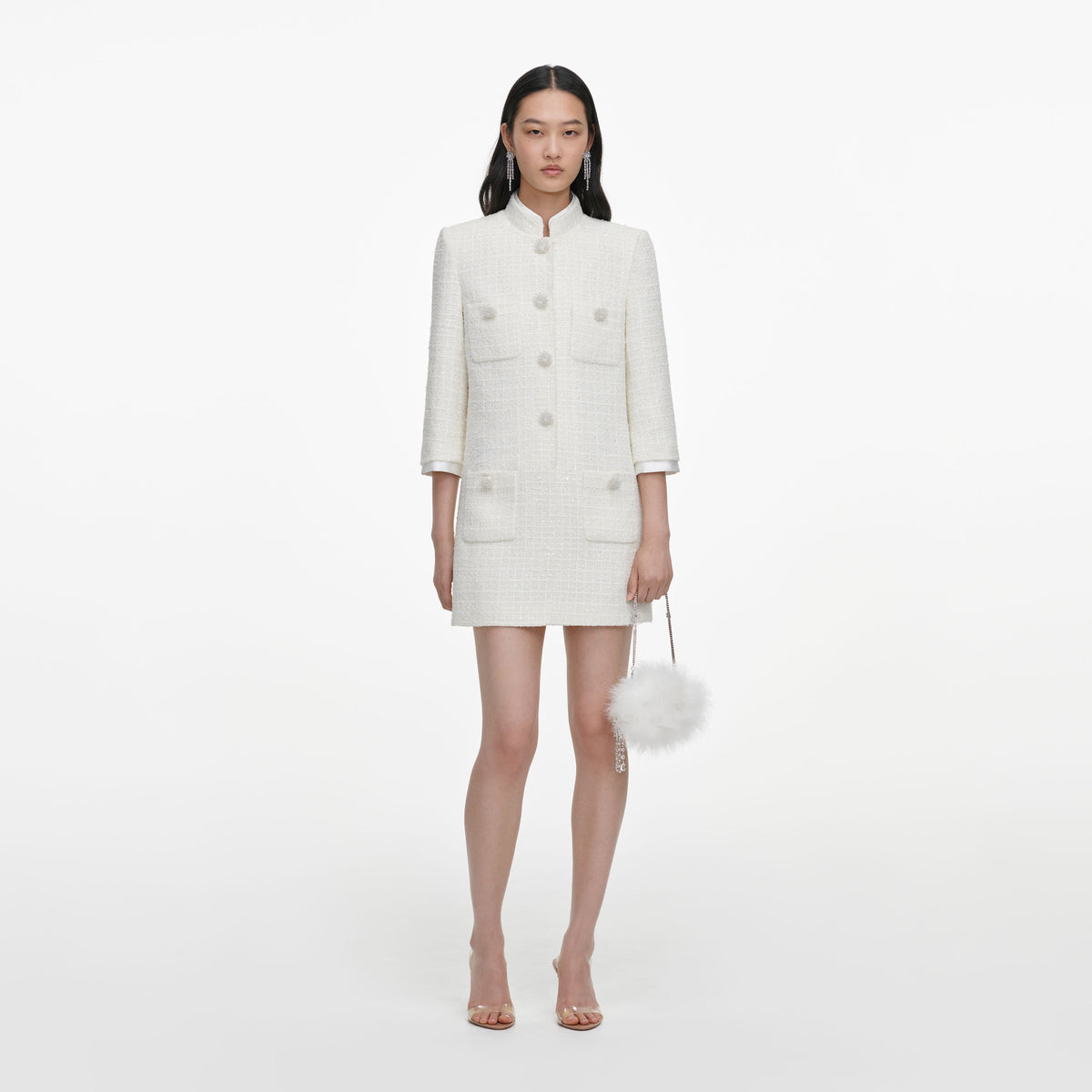 Front view of a woman wearing the Cream Boucle Mini Dress