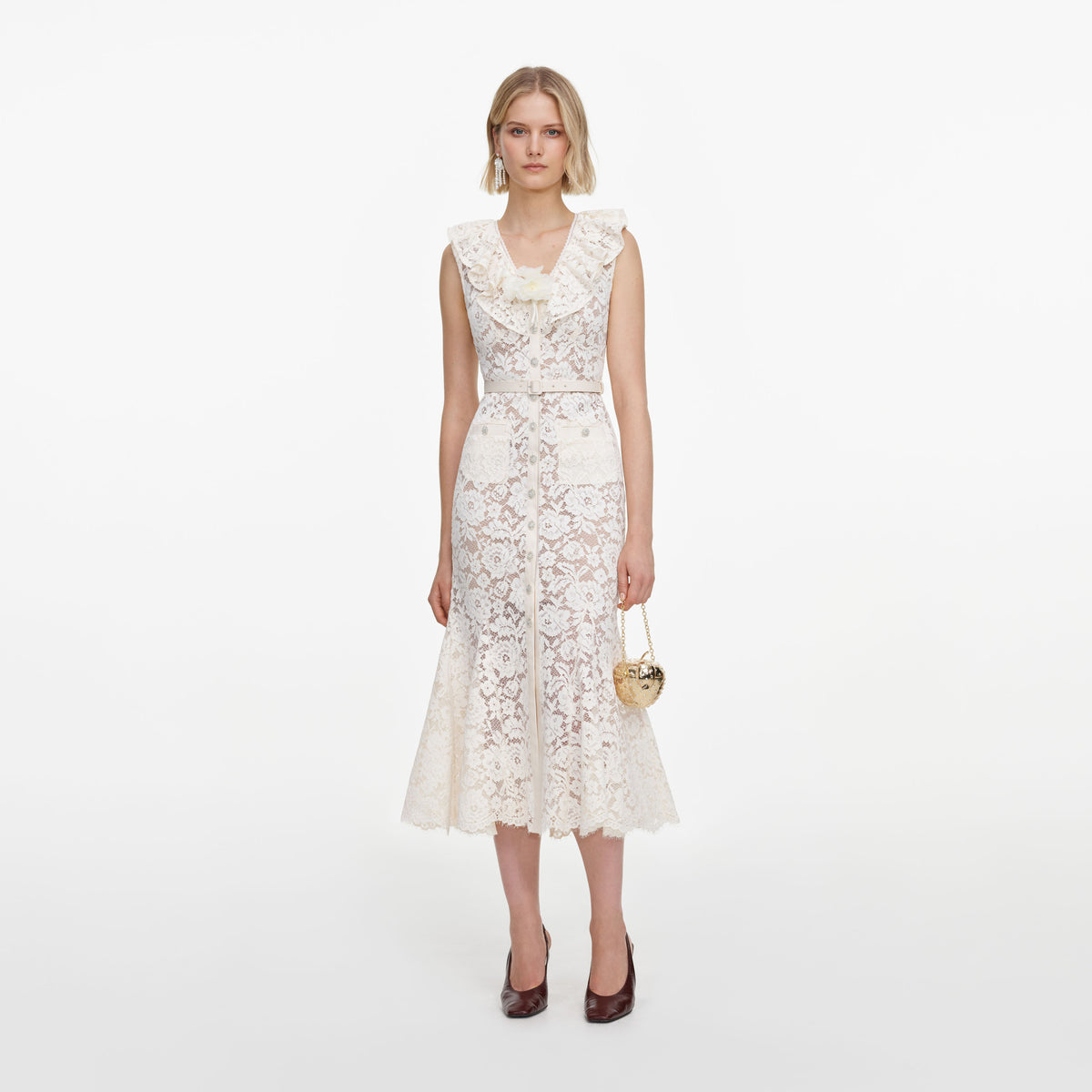Front view of a woman wearing the Cream Lace Flower Midi Dress