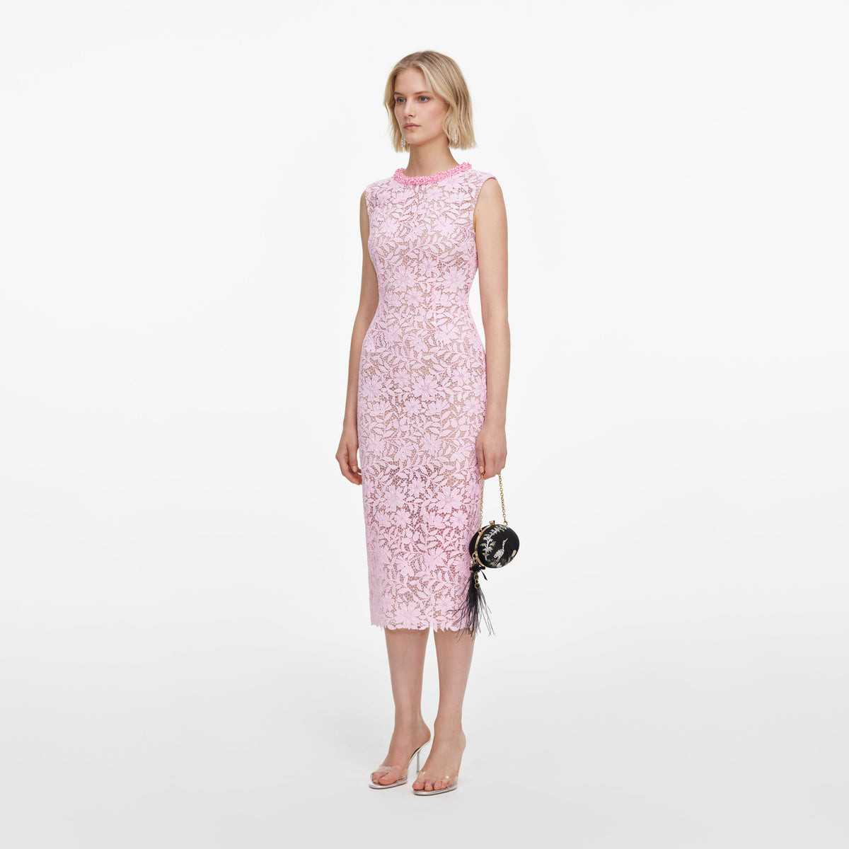Side view of a woman wearing the Pink Lace Beaded Trim Midi Dress
