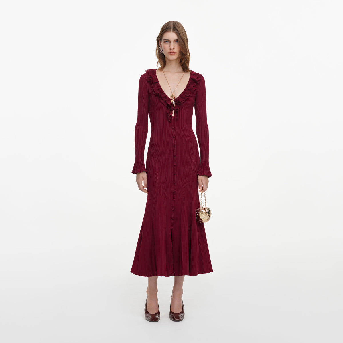 Front view of a woman wearing the Burgundy Ruffle Knit Midi Dress