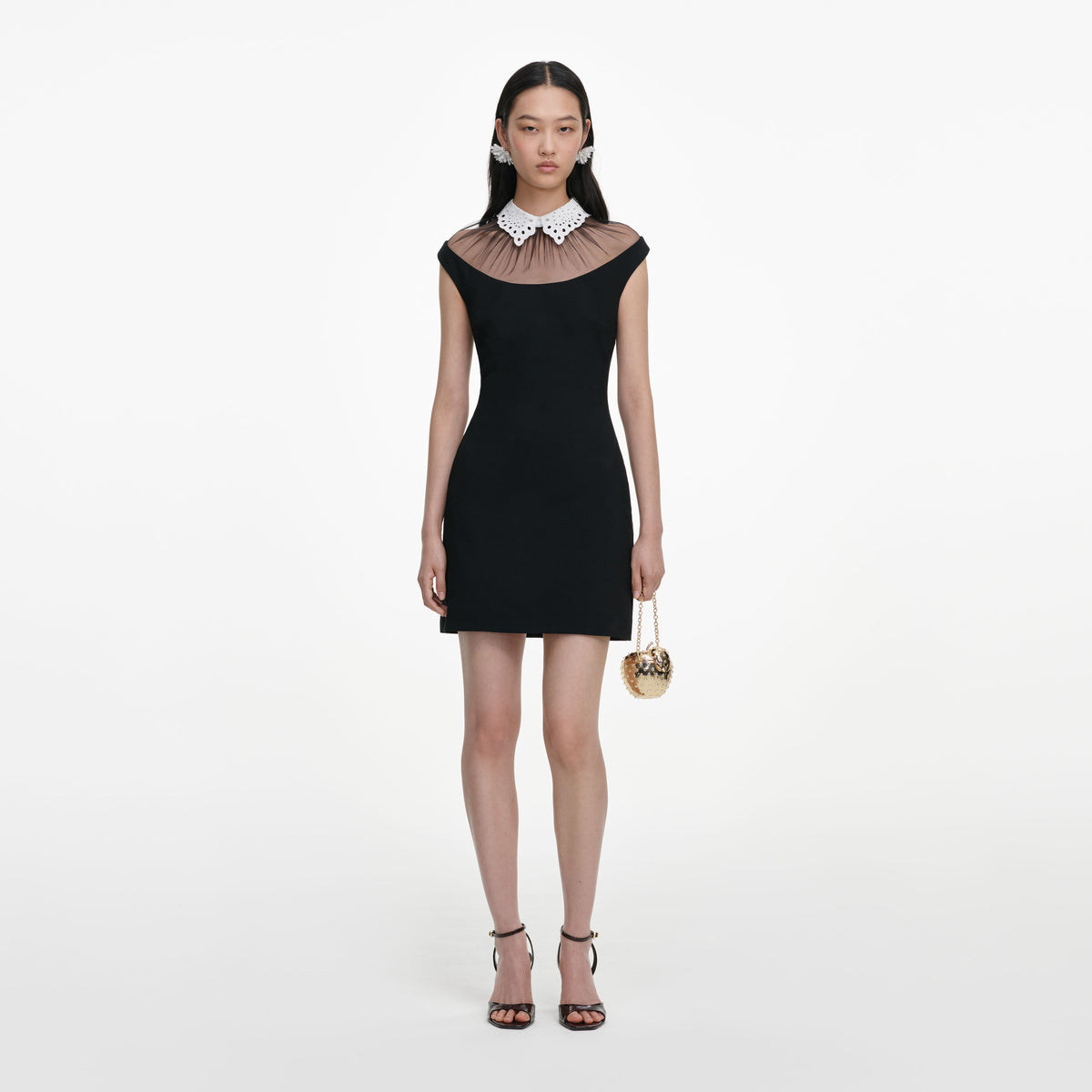 Front view of a woman wearing the Black Crepe Contrast Collar Mini Dress