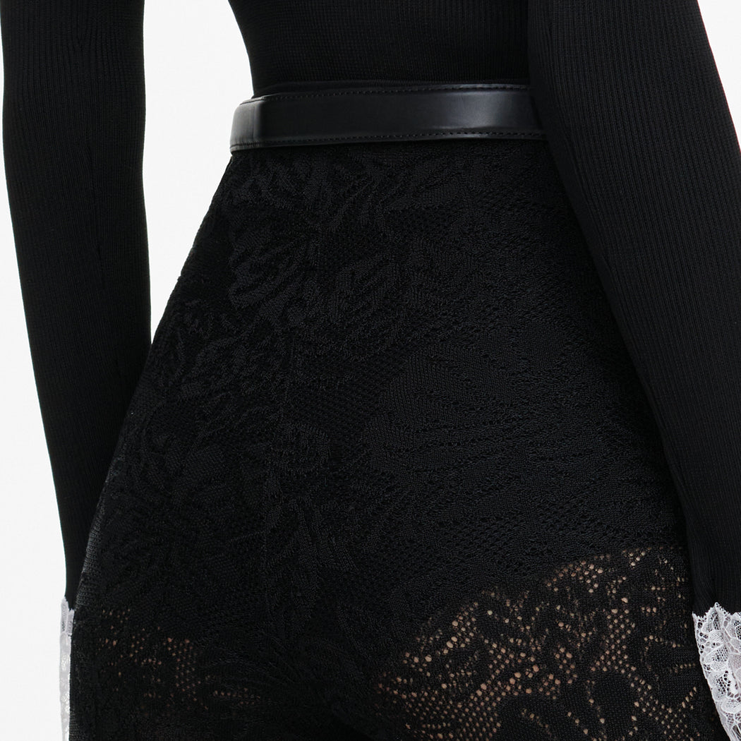 A close up of the fabric for the Black Capri Lace Knit Leggings