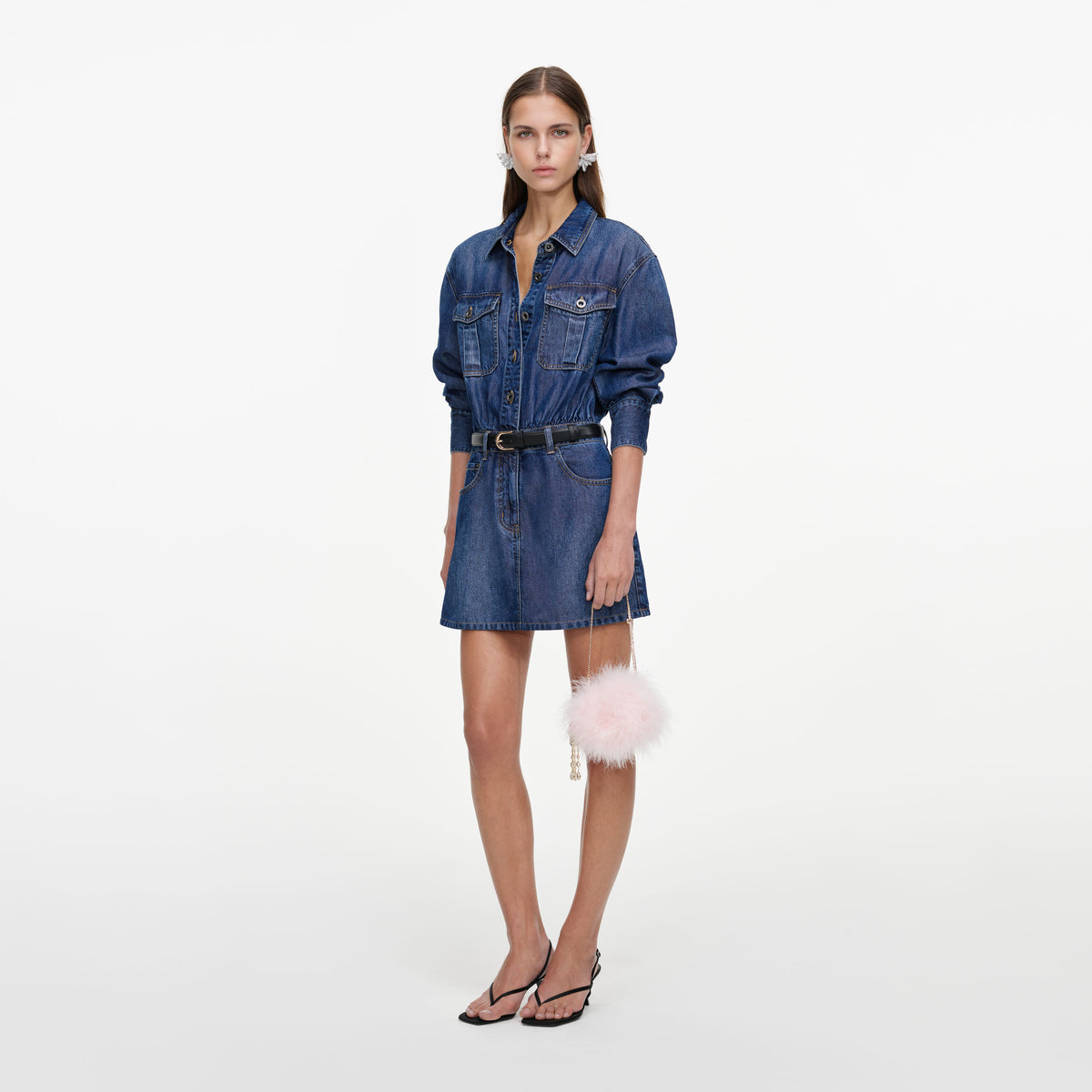 Side view of a woman wearing the Lightweight Denim Mini Dress