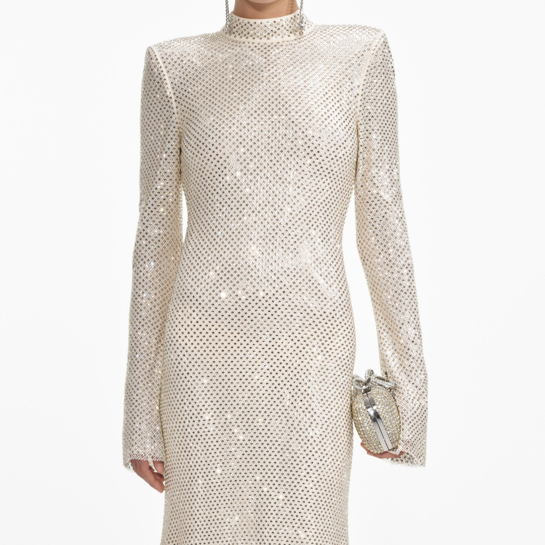 A close up of a woman wearing the Cream Square Rhinestone Fishnet Midi Dress