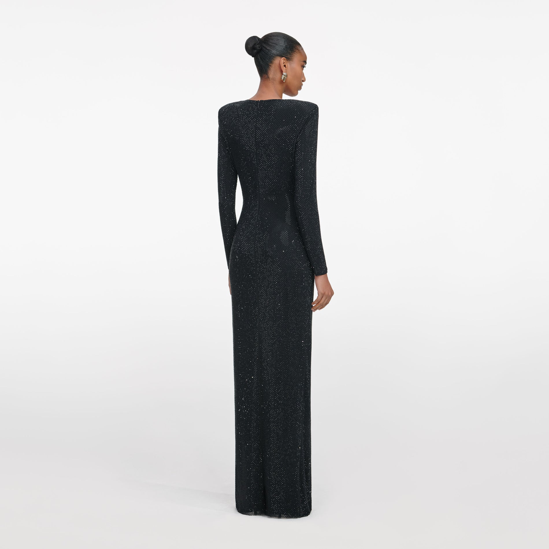 Back view of a woman wearing the Black Rhinestone Embellished Maxi Dress