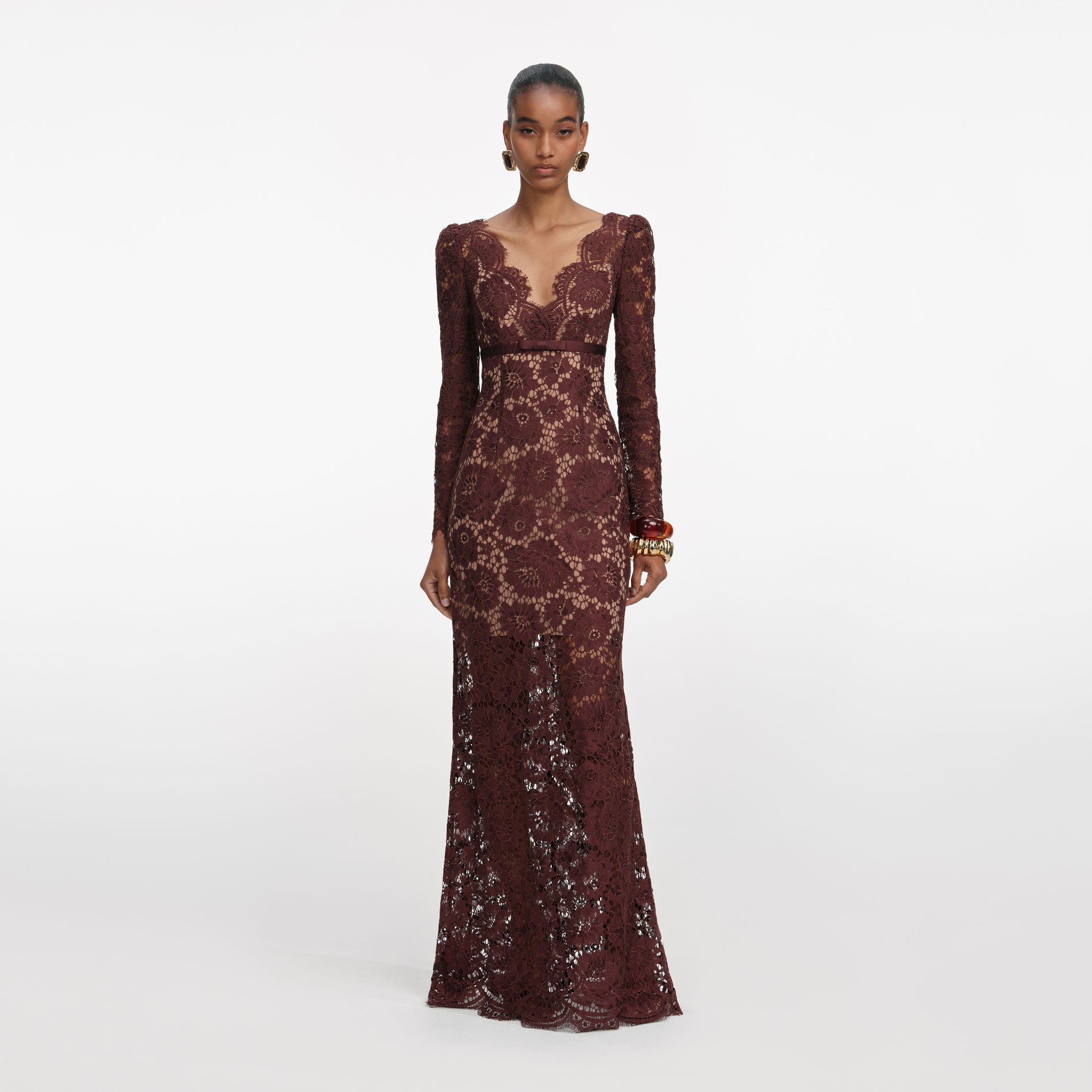 Front view of a woman wearing the Brown Floral Lace Maxi Dress