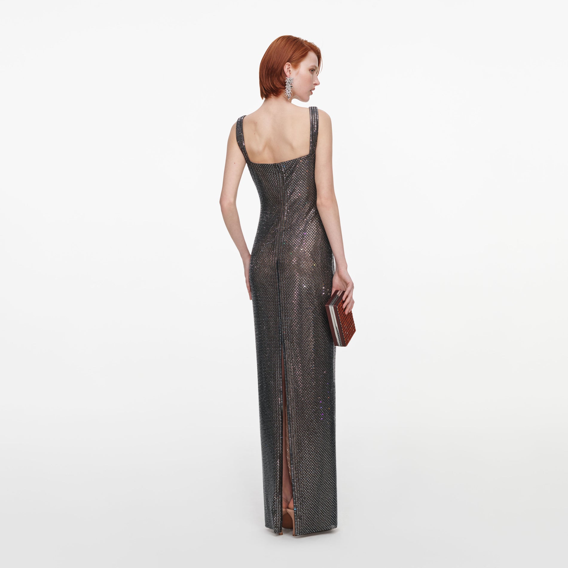 Back view of a woman wearing the Gunmetal Square Neck Rhinestone Maxi Dress