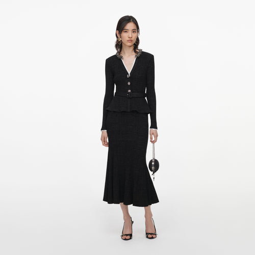 Front view of a woman wearing the Black Lurex Rib Knit Midi Dress
