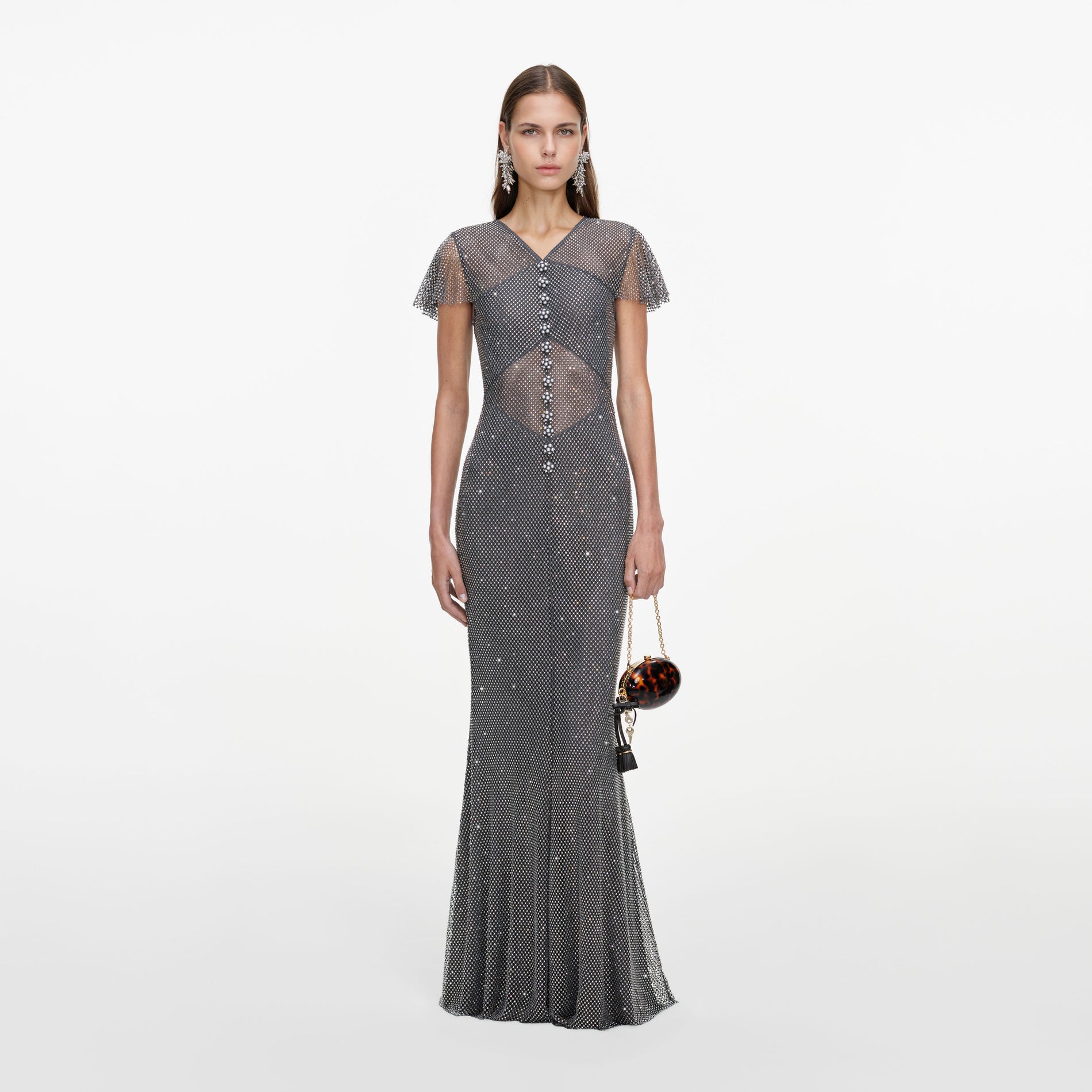 Front view of a woman wearing the Grey Rhinestone Fishnet Maxi Dress