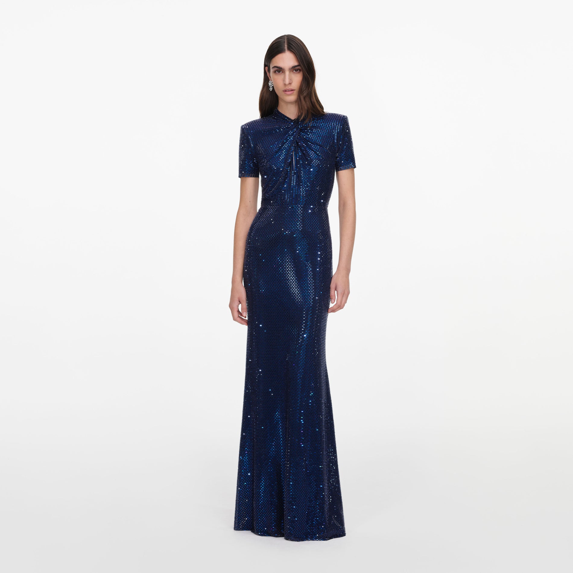 Front view of a woman wearing the Navy Rhinestone Mesh Twist Maxi Dress