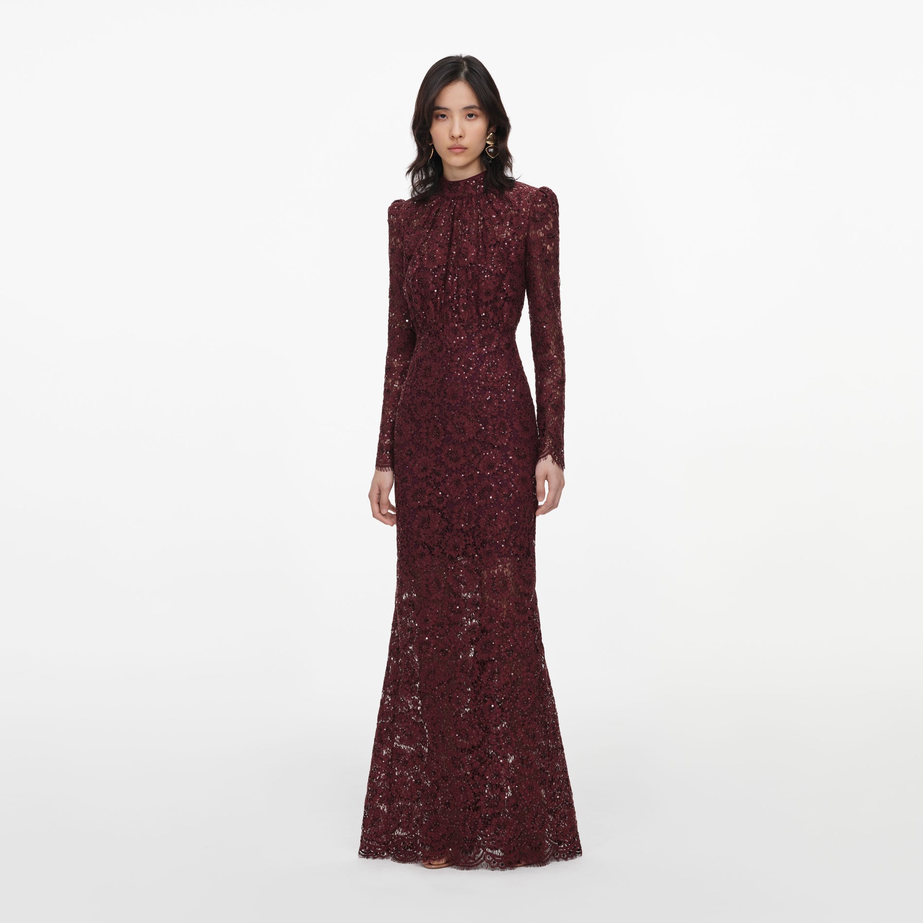 Side view of a woman wearing the Burgundy Sequin Lace Maxi Dress