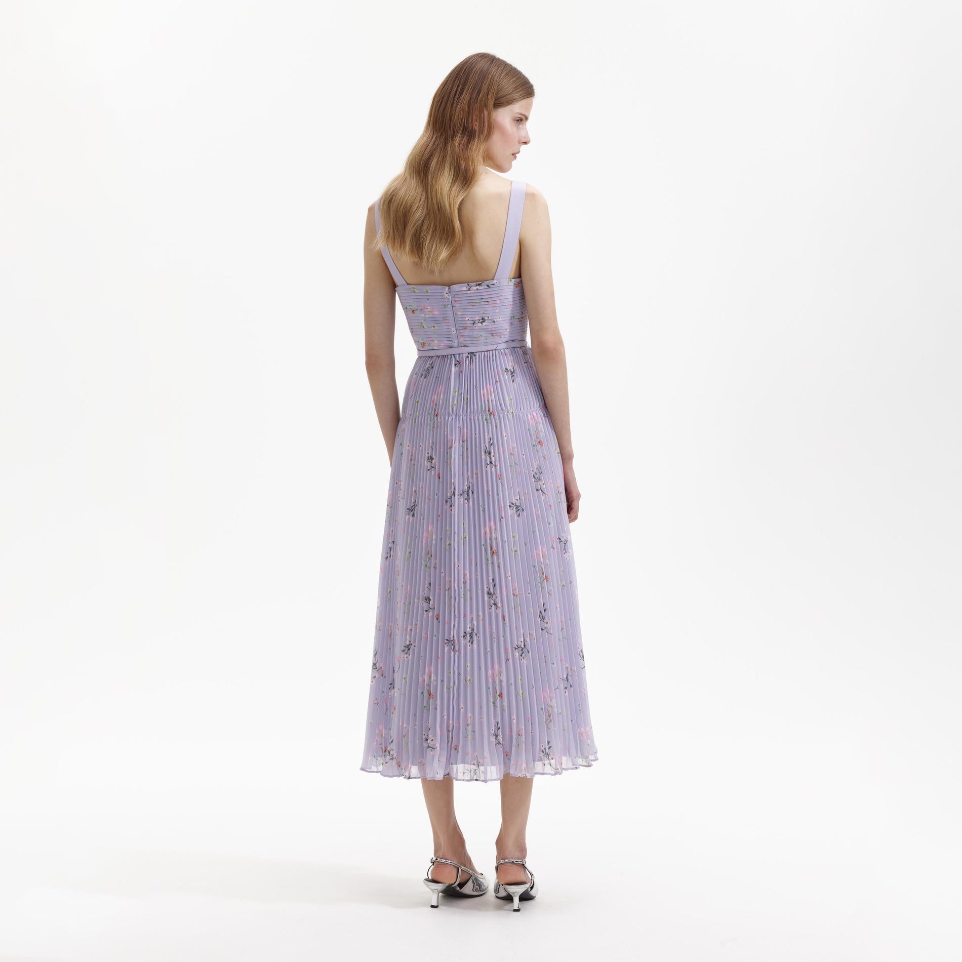 Back view of a woman wearing the Lilac Floral Chiffon Midi Dress