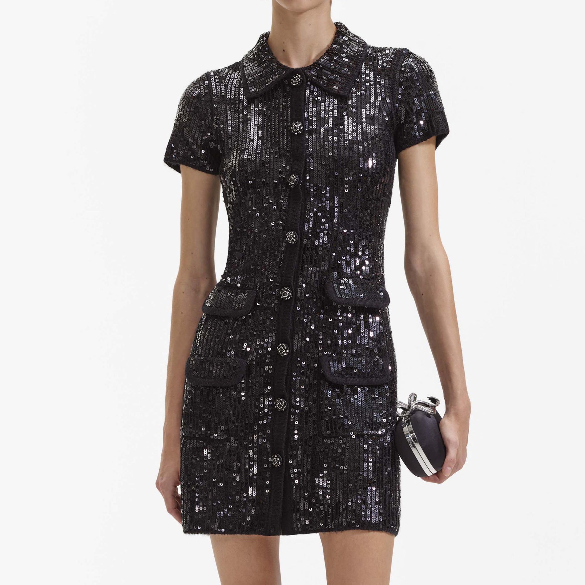 Fabric detail shot of the Black Knit Sequin Mini Dress