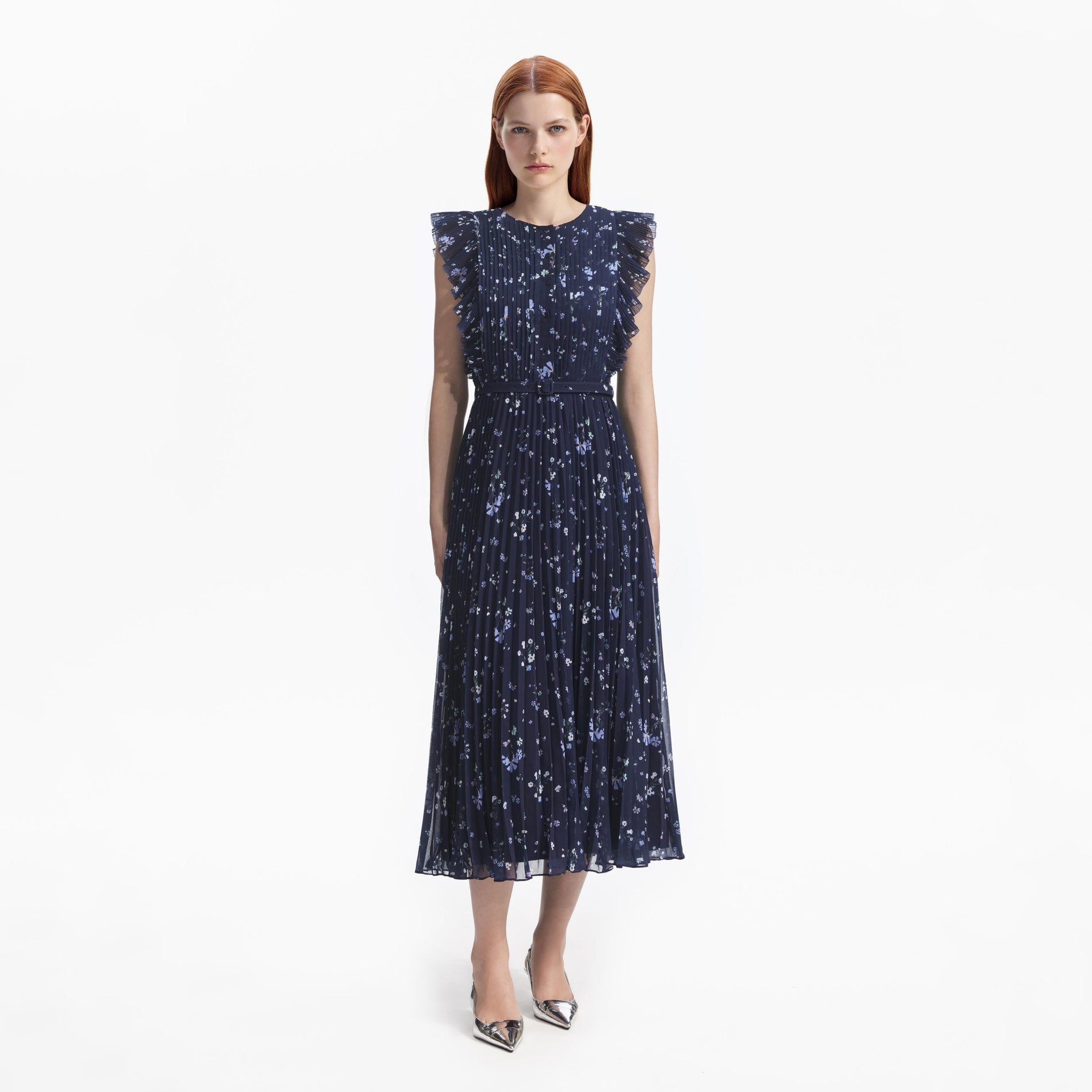 Front view of a woman wearing the Navy Floral Chiffon Midi Dress
