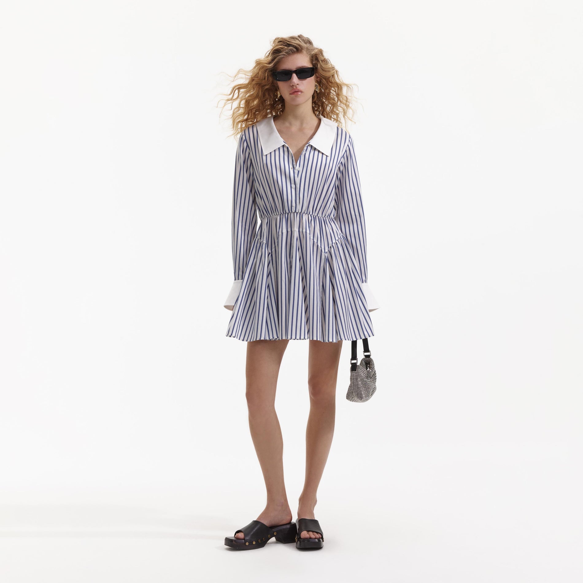 Front view of a woman wearing the Blue Stripe Cotton Mini Dress
