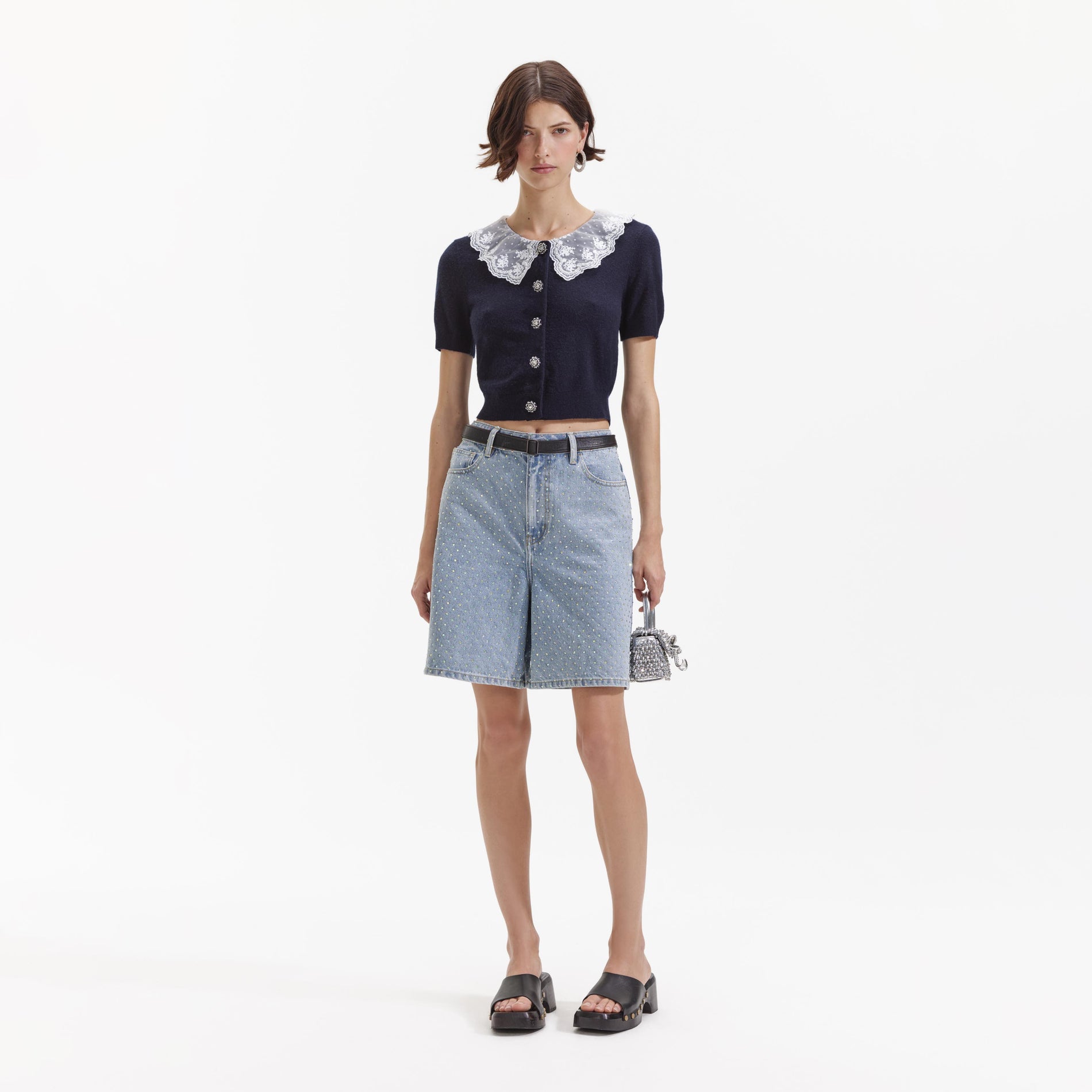 Front view of a woman wearing the Navy Cashmere Blend Collar Cardigan