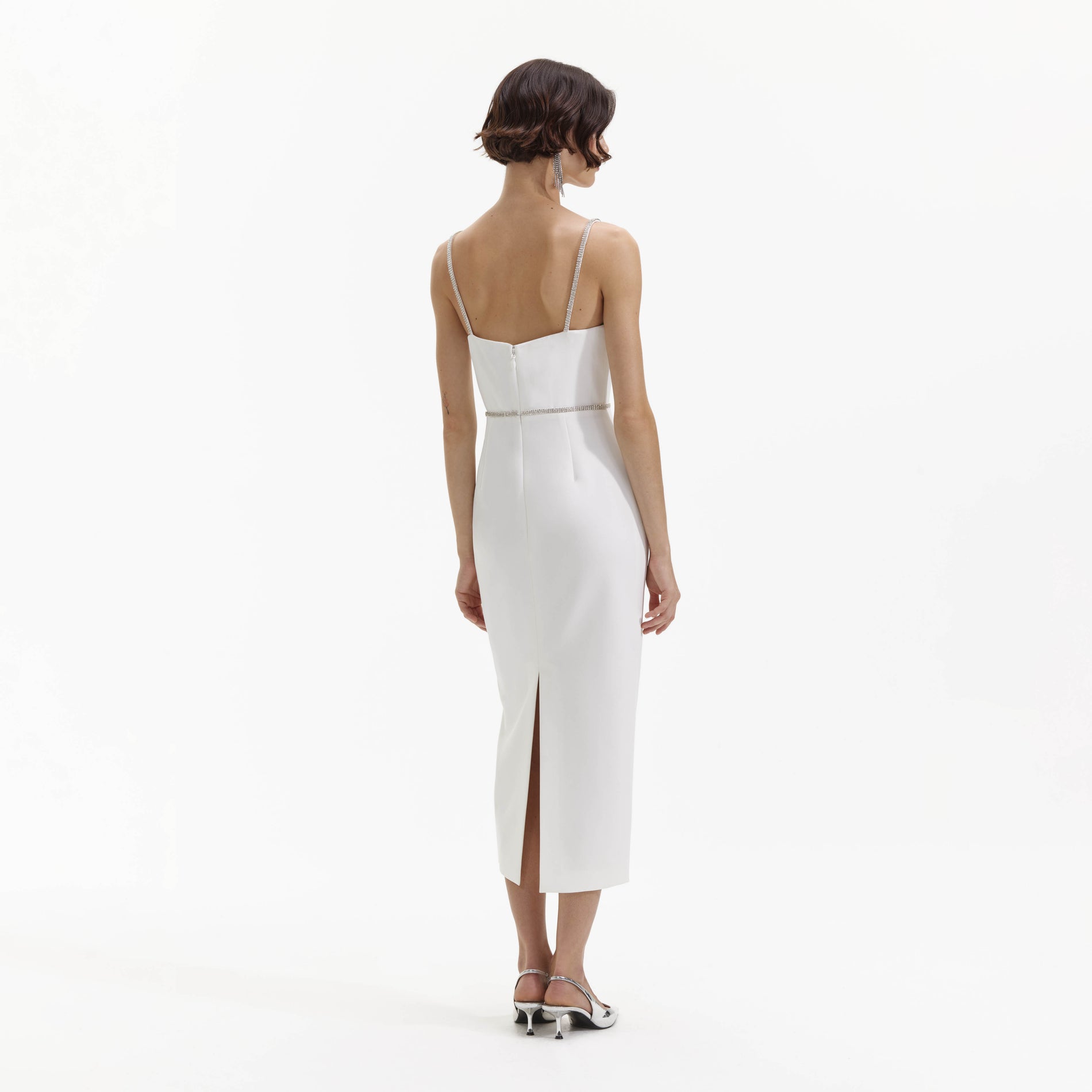 Back view of a woman wearing the White Bonded Crepe Midi Dress