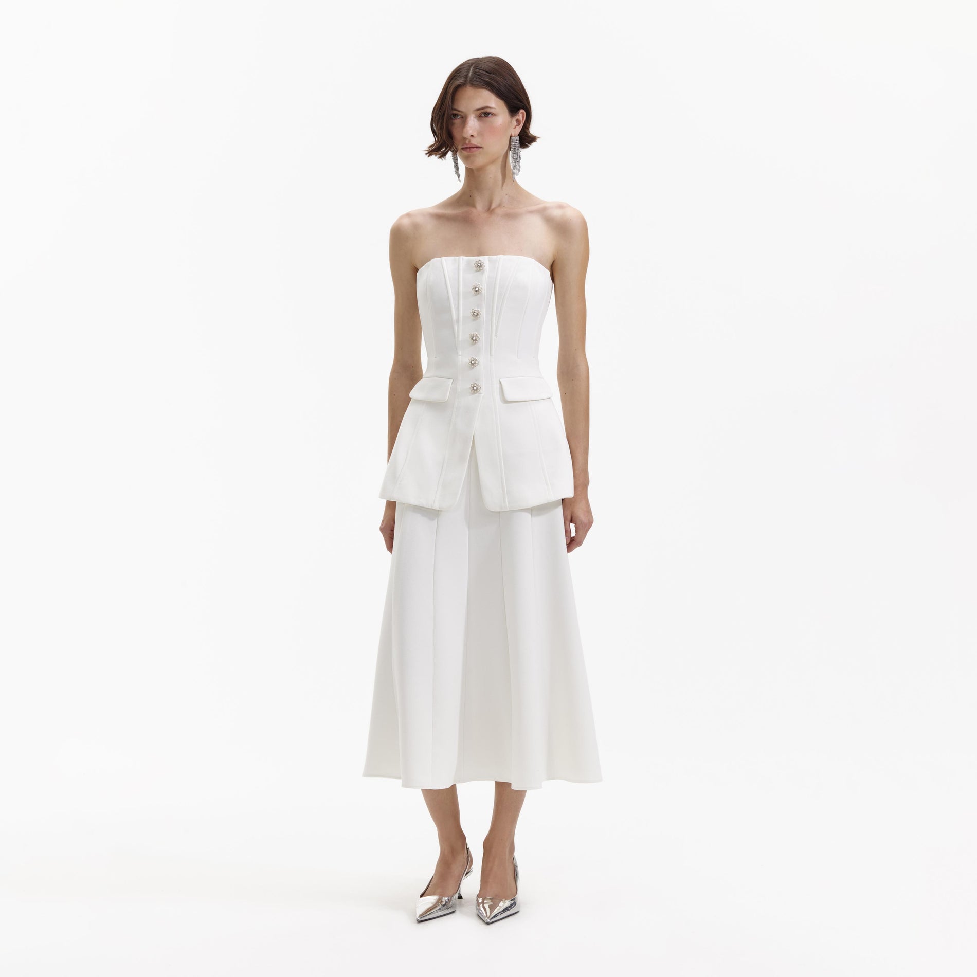 Side view of a woman wearing the White Bandeau Crepe Midi Dress
