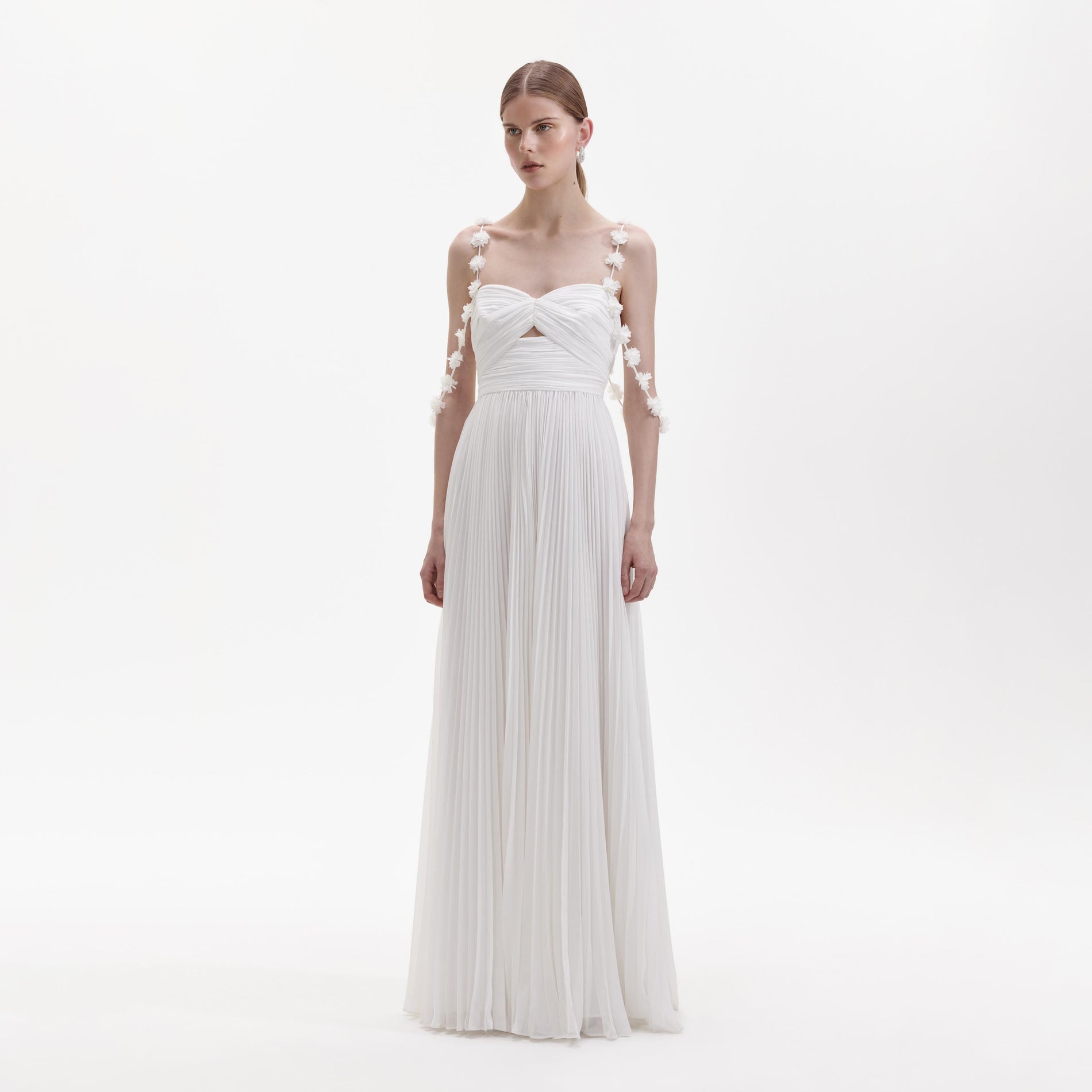 Side view of a woman wearing the White Chiffon Flower Maxi Dress