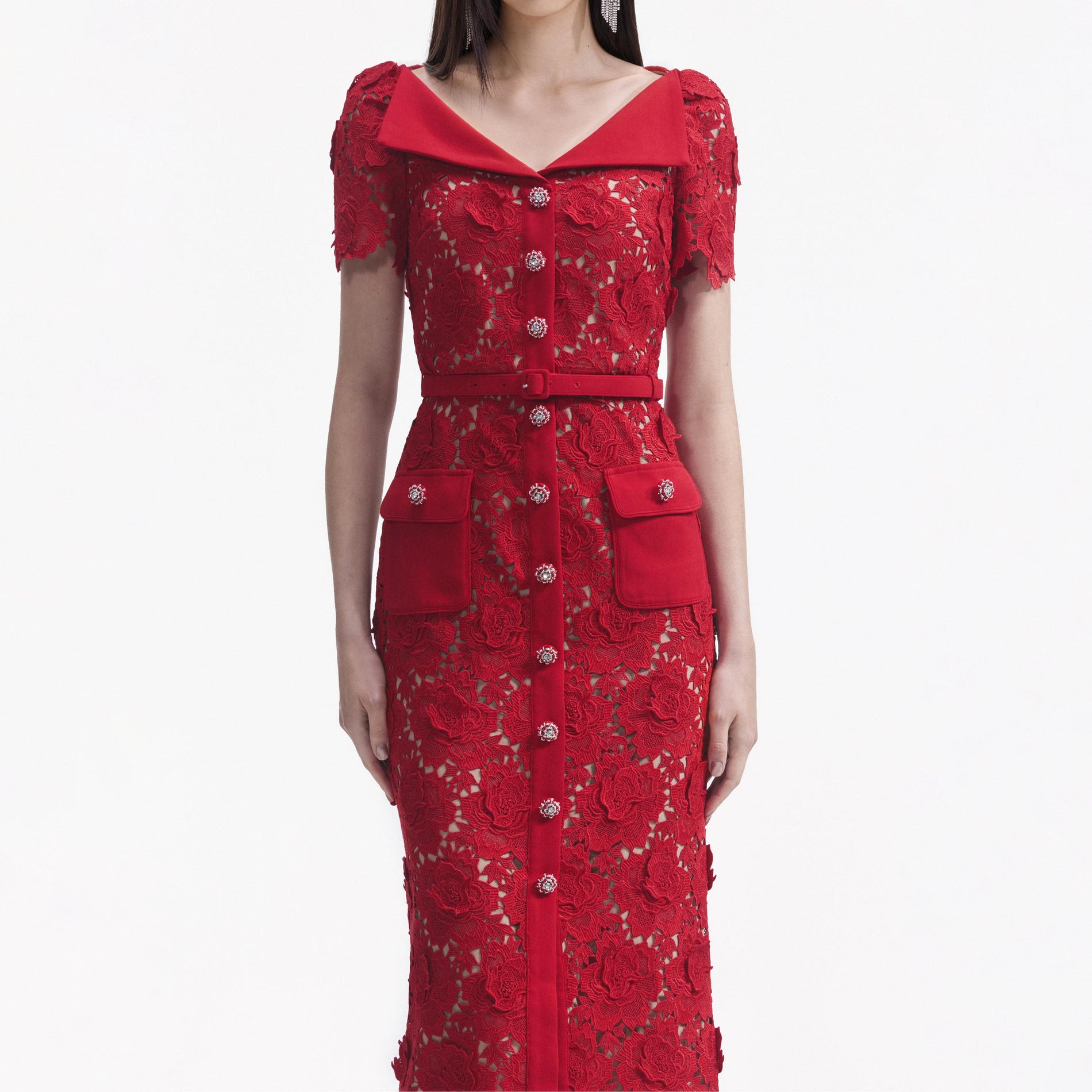 A close up of a woman wearing the Red Lace Open Neck Midi Dress