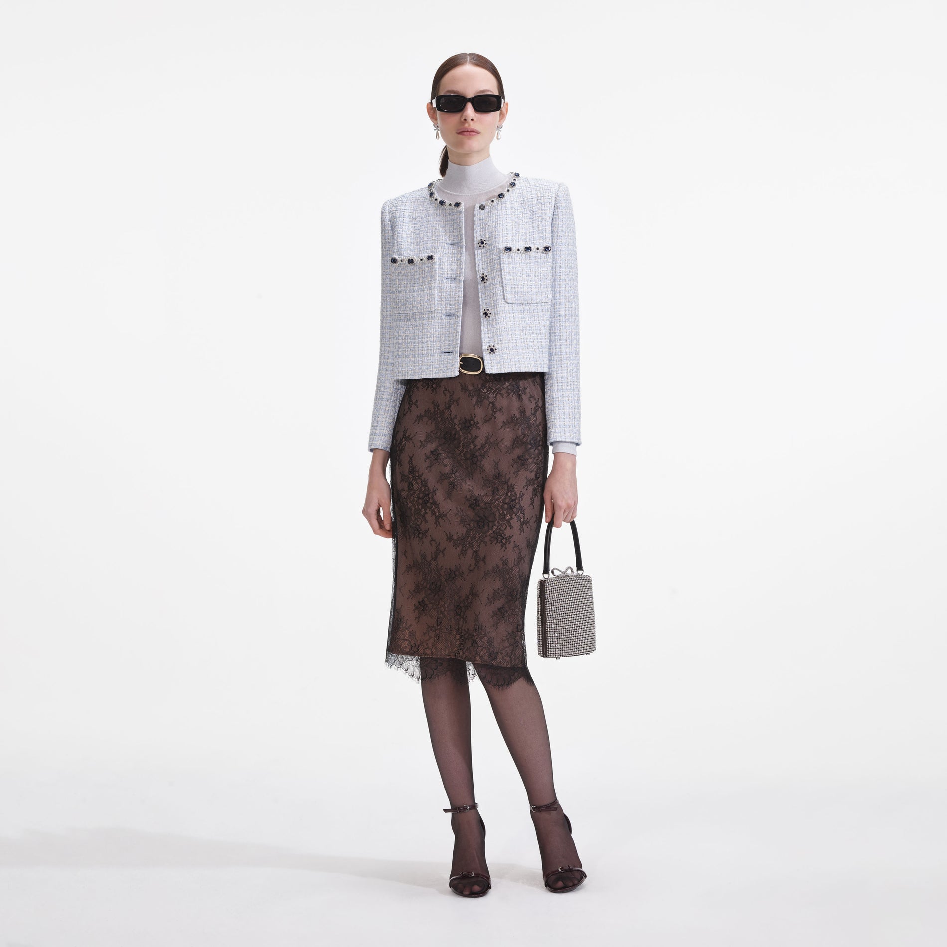 Front view of a woman wearing the Blue Boucle Jacket